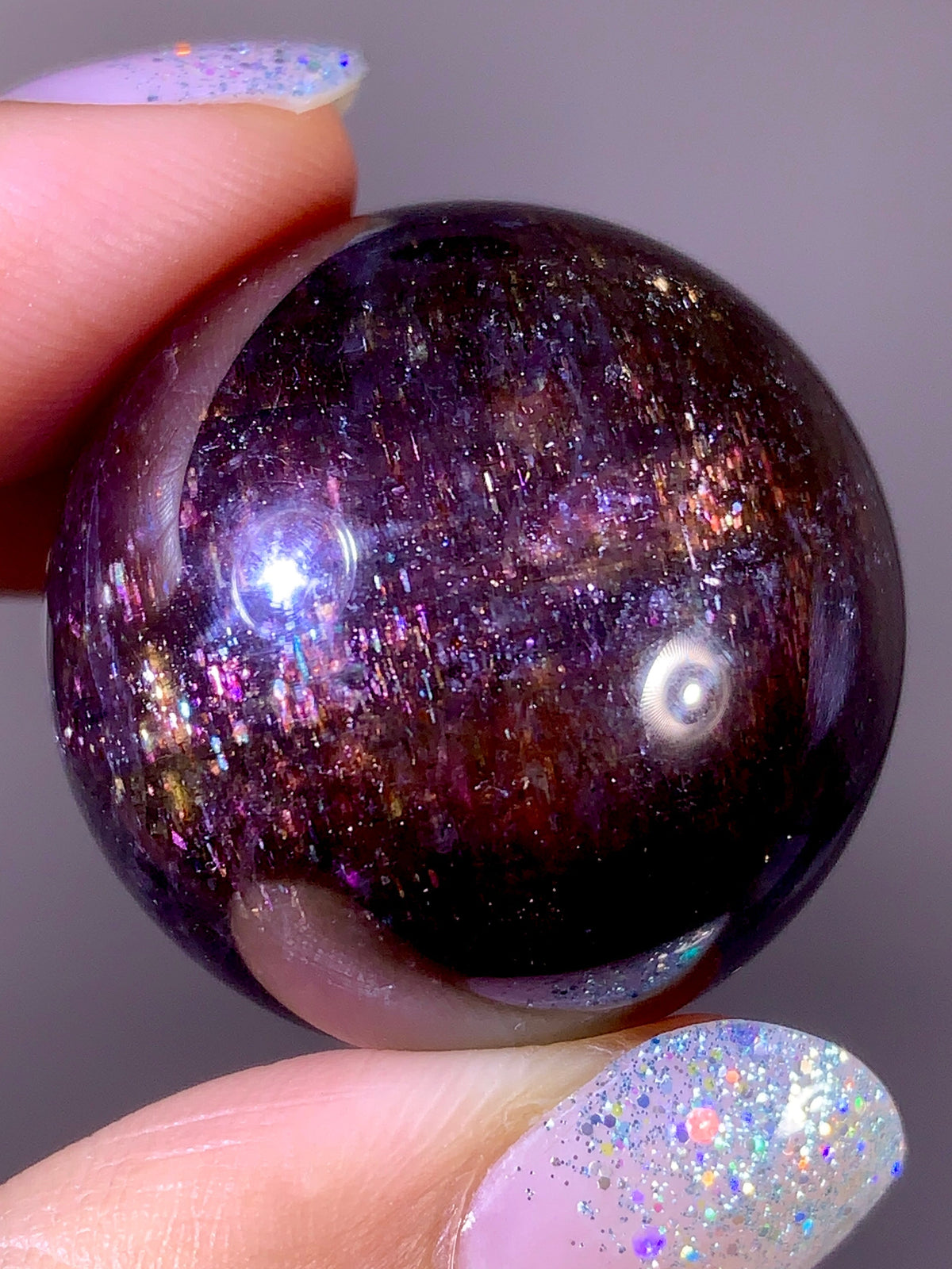 Collector-Grade Galaxy Iolite & Sunstone Bloodshot Sphere | Tanzania