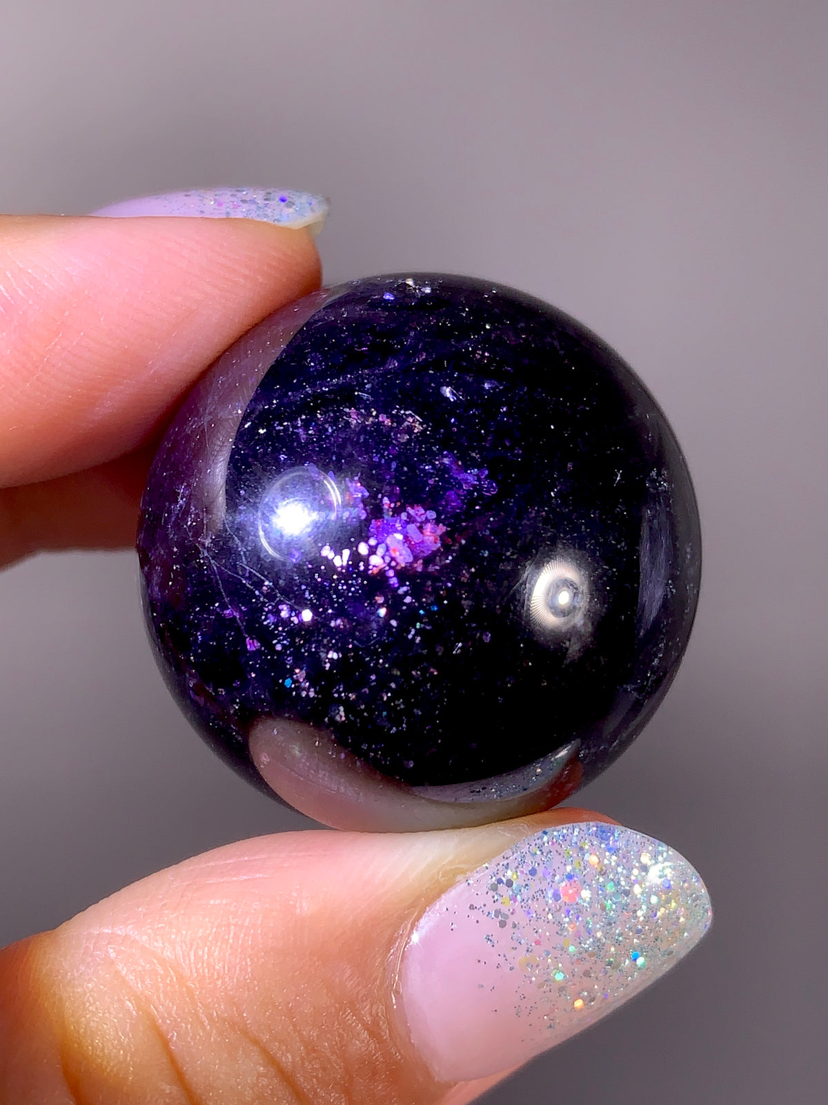 Collector-Grade Galaxy Iolite & Sunstone Bloodshot Sphere | Tanzania