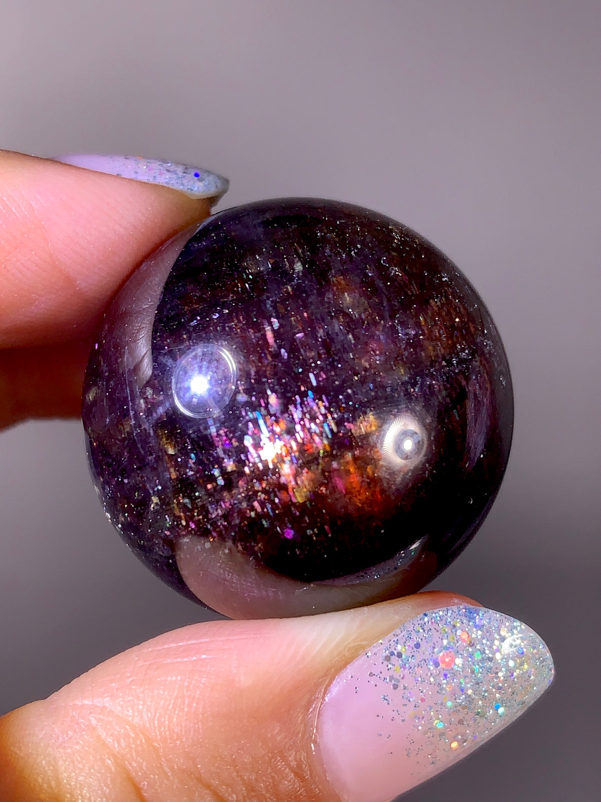 Collector-Grade Galaxy Iolite & Sunstone Bloodshot Sphere | Tanzania
