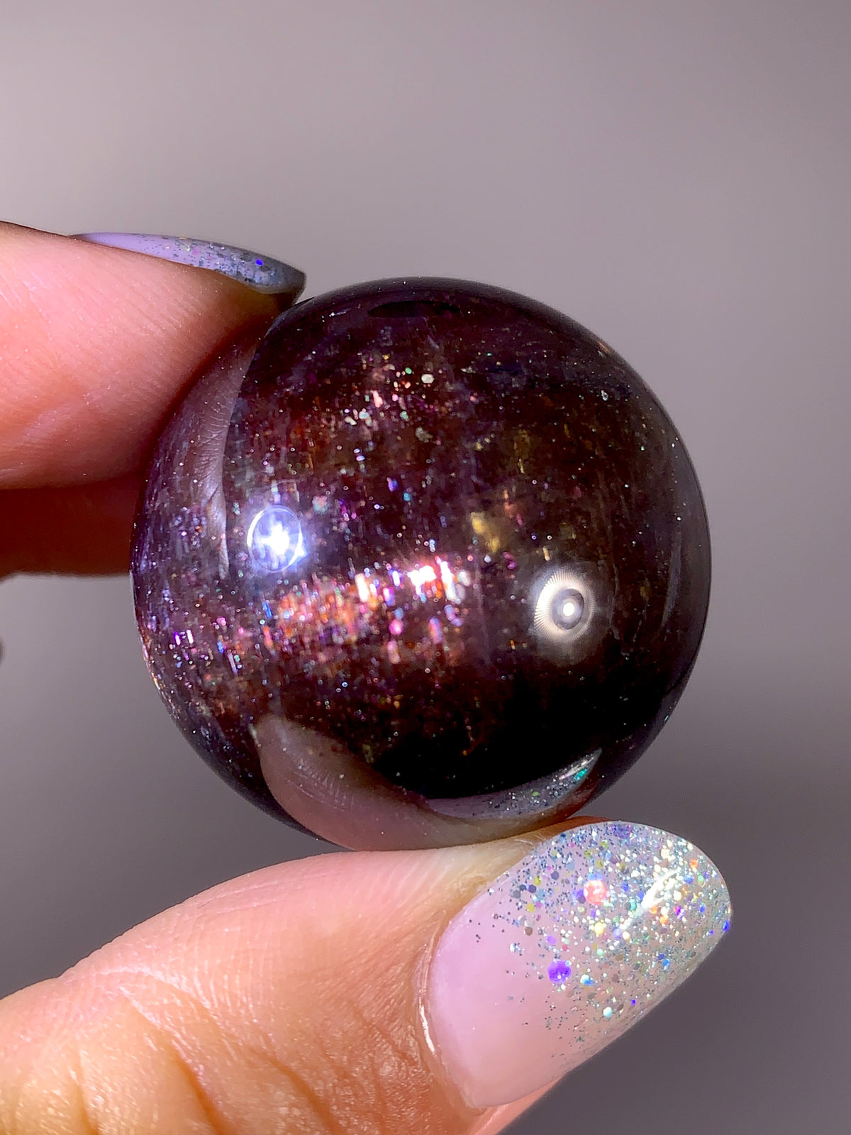 Collector-Grade Galaxy Iolite & Sunstone Bloodshot Sphere | Tanzania
