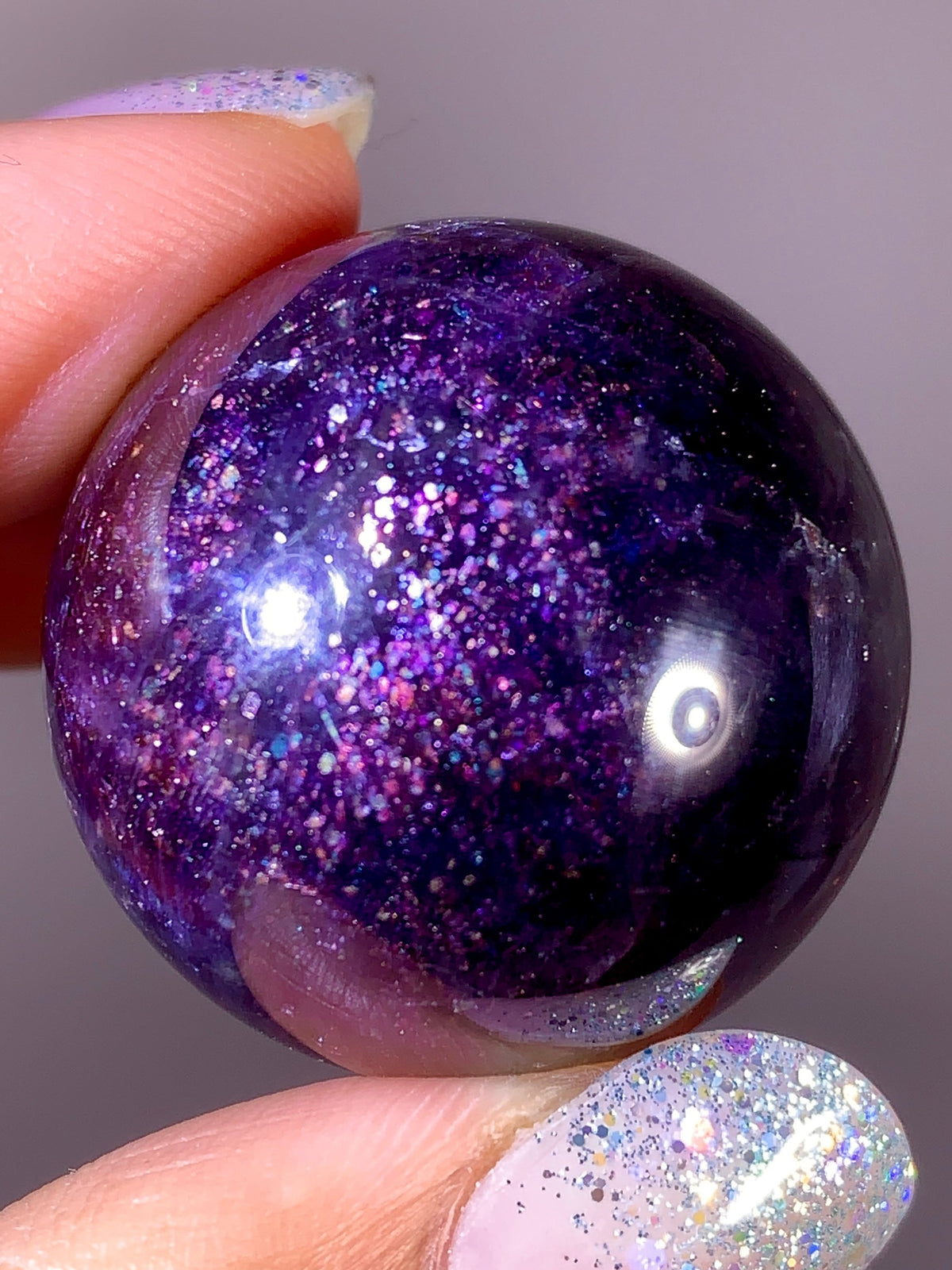 Collector-Grade Galaxy Iolite & Sunstone Bloodshot Sphere | Tanzania