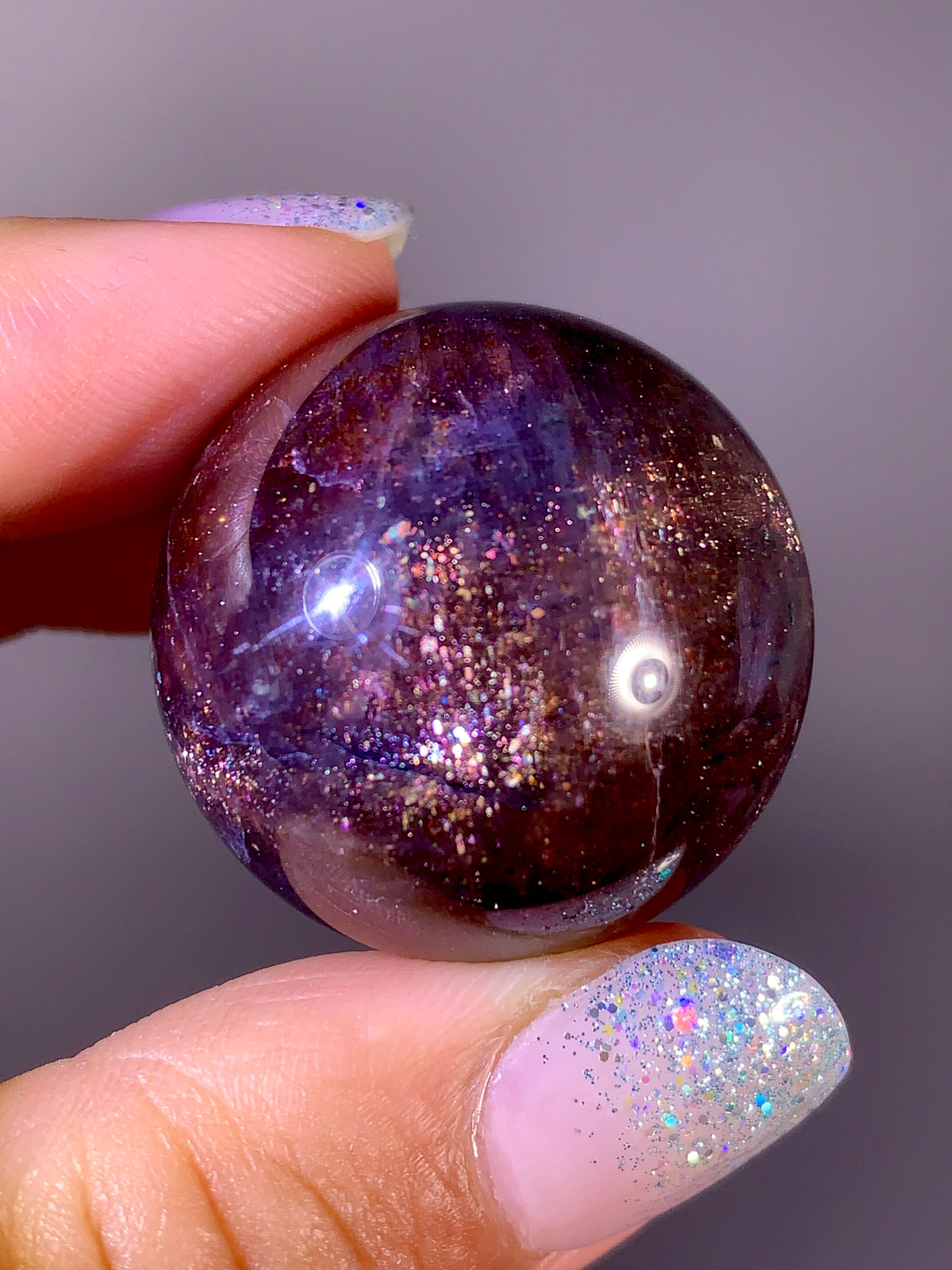 Collector-Grade Galaxy Iolite & Sunstone Bloodshot Sphere | Tanzania