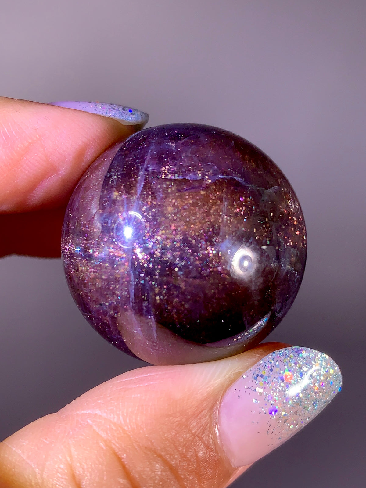 Collector-Grade Galaxy Iolite & Sunstone Bloodshot Sphere | Tanzania