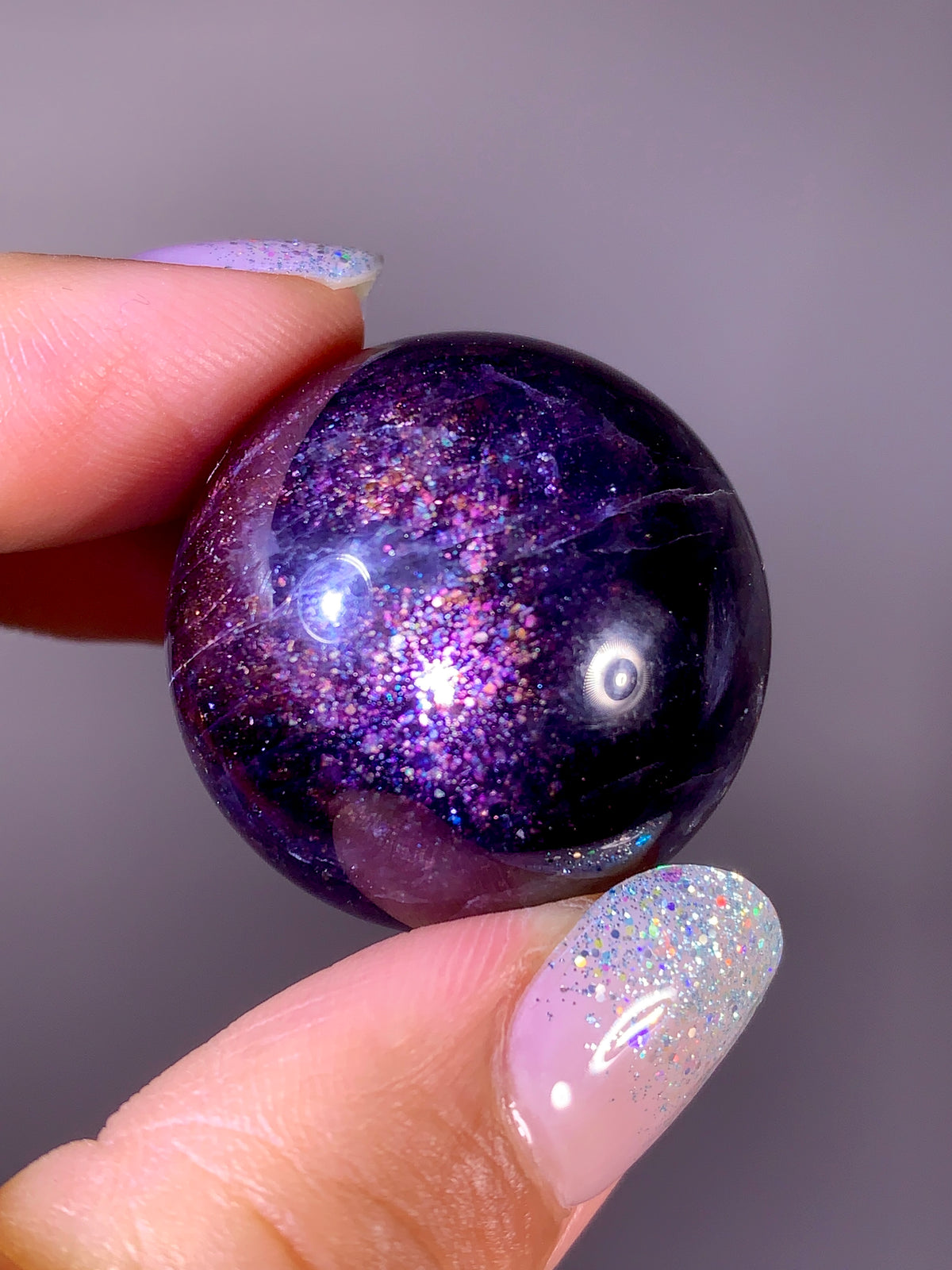 Collector-Grade Galaxy Iolite & Sunstone Bloodshot Sphere | Tanzania