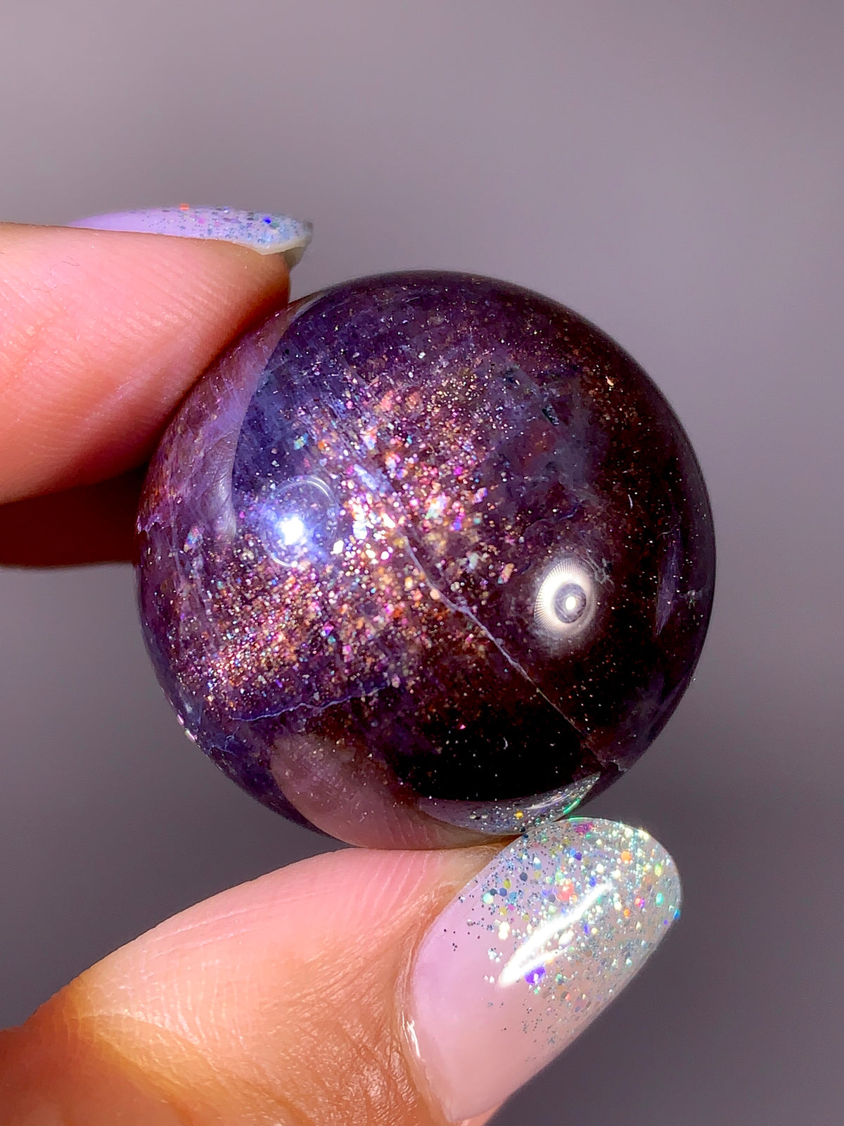 Collector-Grade Galaxy Iolite & Sunstone Bloodshot Sphere | Tanzania
