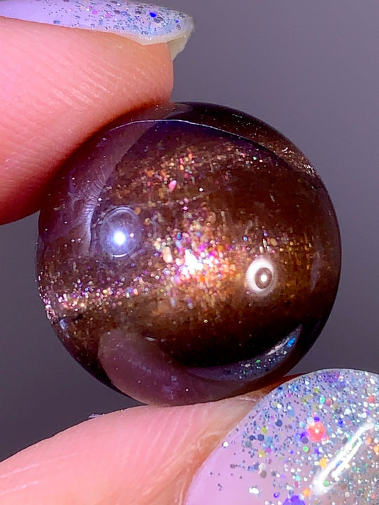 High-Grade Galaxy Iolite & Sunstone Bloodshot Sphere | Tanzania
