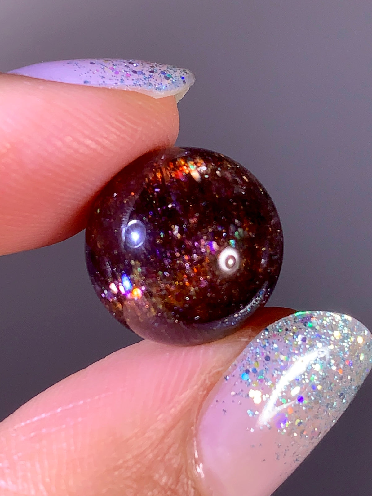 Collector-Grade Galaxy Iolite & Sunstone Bloodshot Sphere | Tanzania