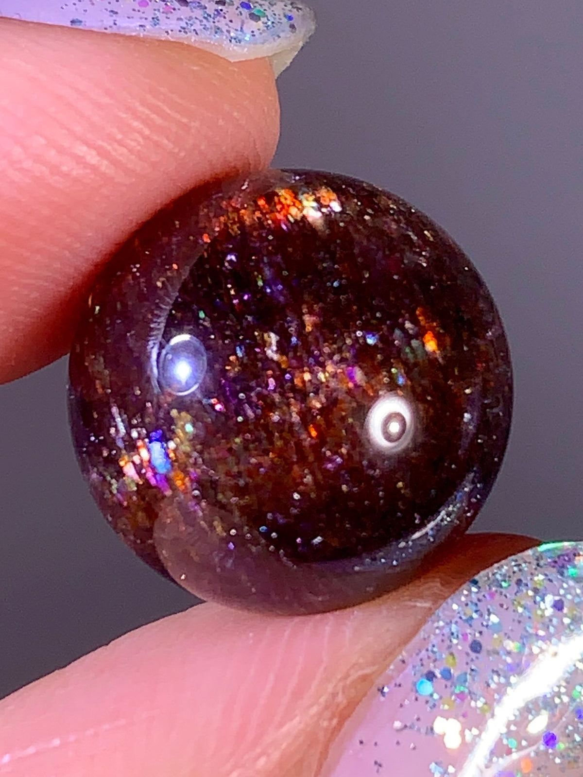 Collector-Grade Galaxy Iolite & Sunstone Bloodshot Sphere | Tanzania