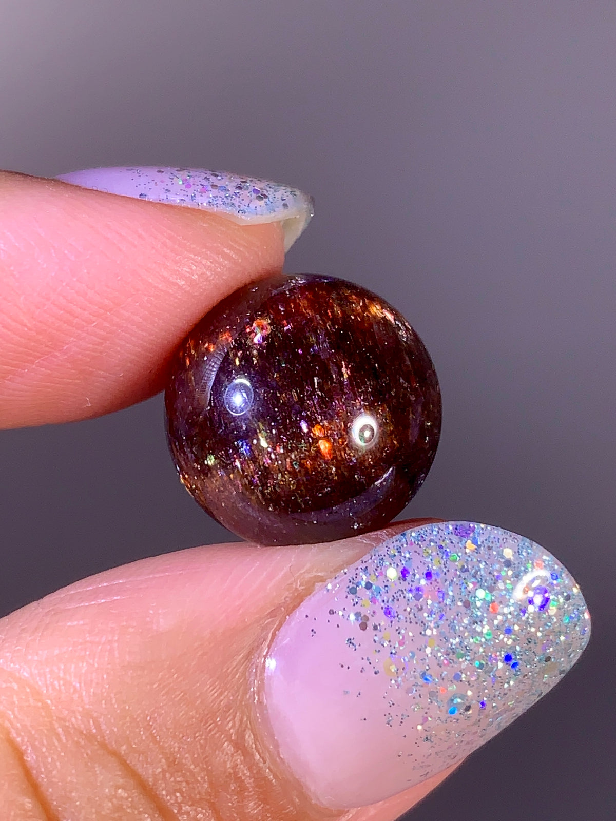 Collector-Grade Galaxy Iolite & Sunstone Bloodshot Sphere | Tanzania