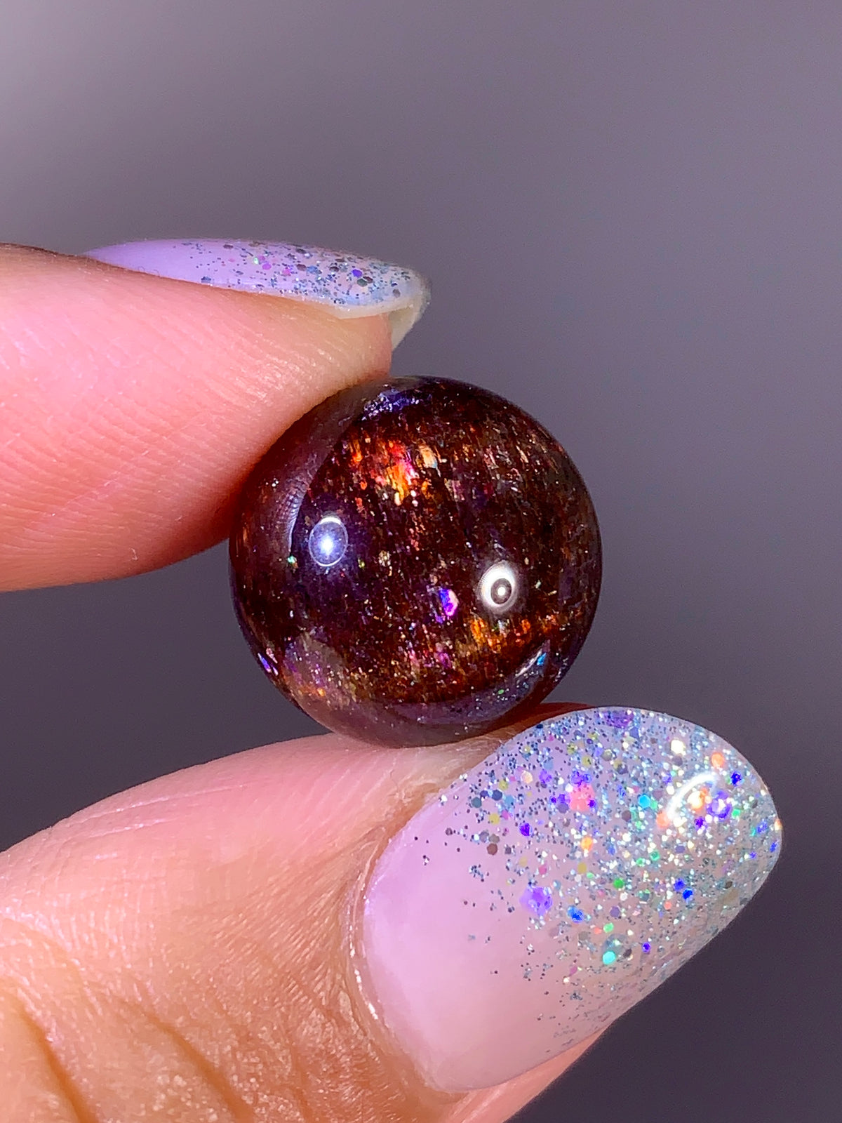 Collector-Grade Galaxy Iolite & Sunstone Bloodshot Sphere | Tanzania