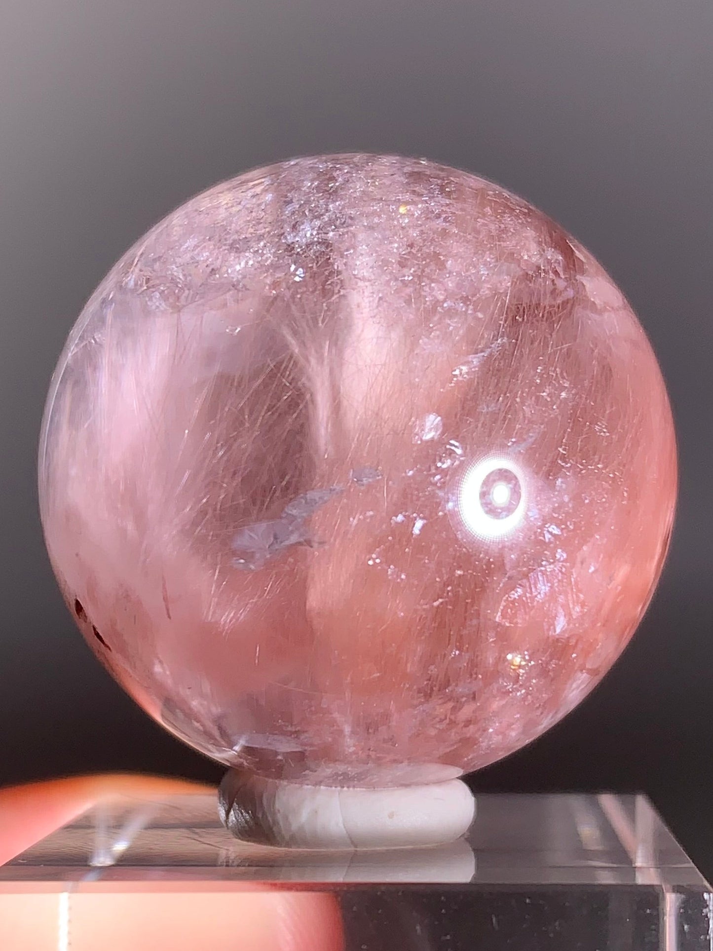 High-Clarity Pink Amphibole Sphere with Silky Textured Inclusions