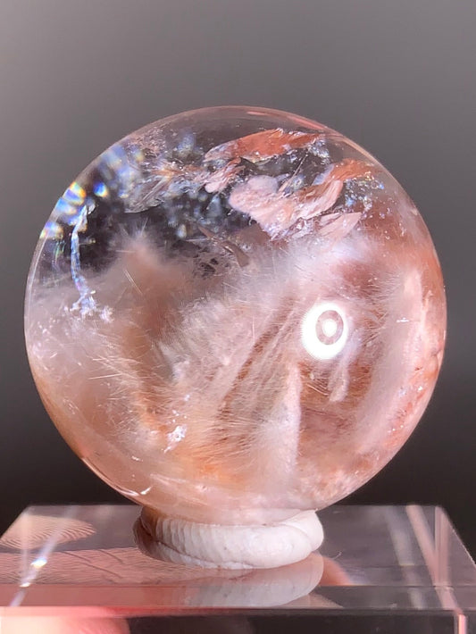 High-Clarity Pink Amphibole Sphere with Silky Textured Inclusions