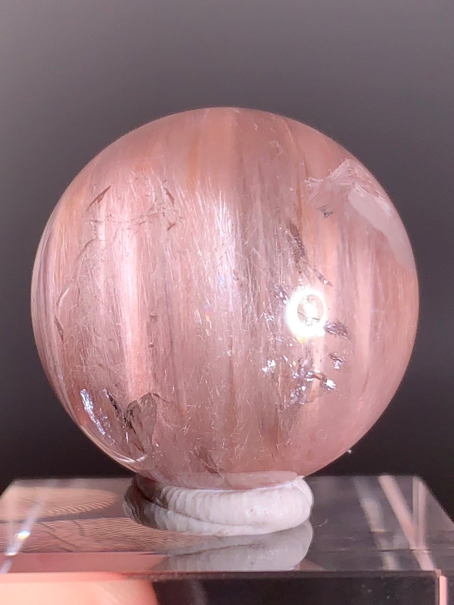 High-Clarity Pink Amphibole Sphere with Silky Textured Inclusions