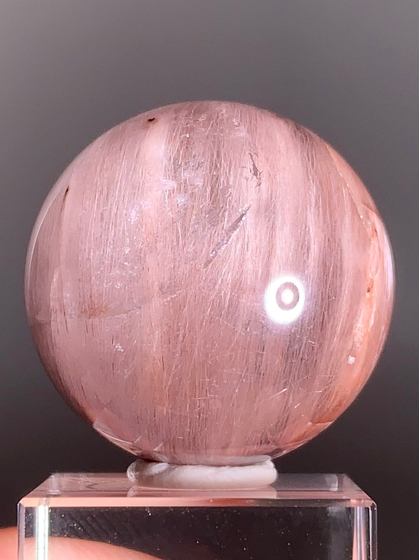 High-Clarity Pink Amphibole Sphere with Silky Textured Inclusions