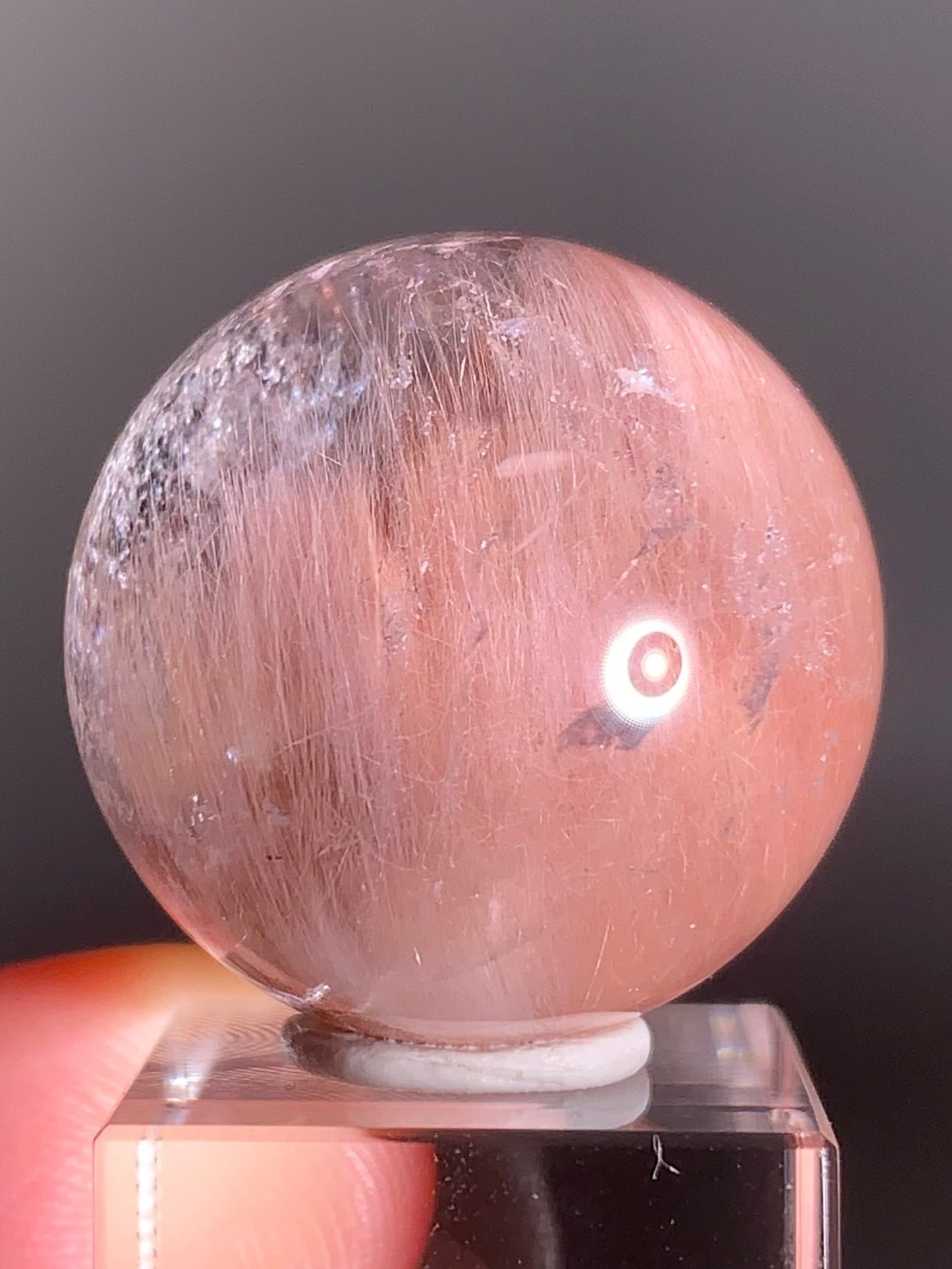 High-Clarity Pink Amphibole Sphere with Silky Textured Inclusions