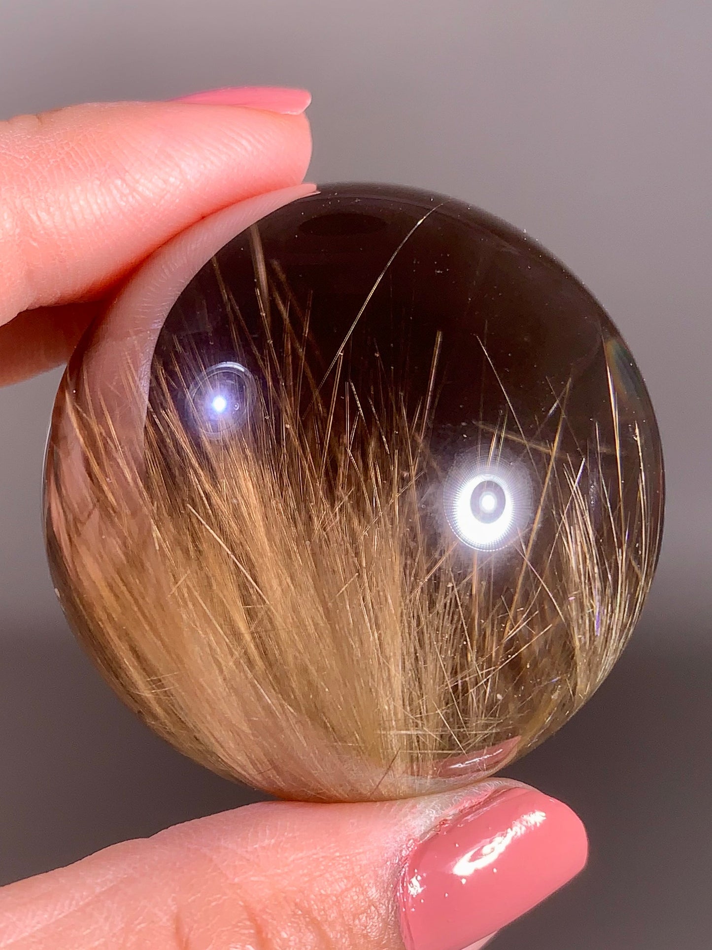 Large Collector’s Grade Gold Rutile in Smoky Quartz Sphere from Brazil
