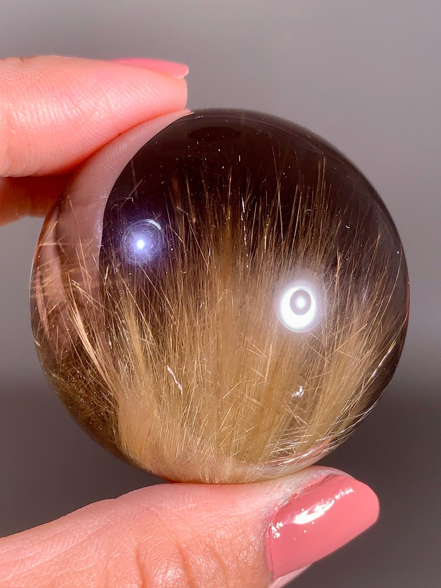 Large Collector’s Grade Gold Rutile in Smoky Quartz Sphere from Brazil