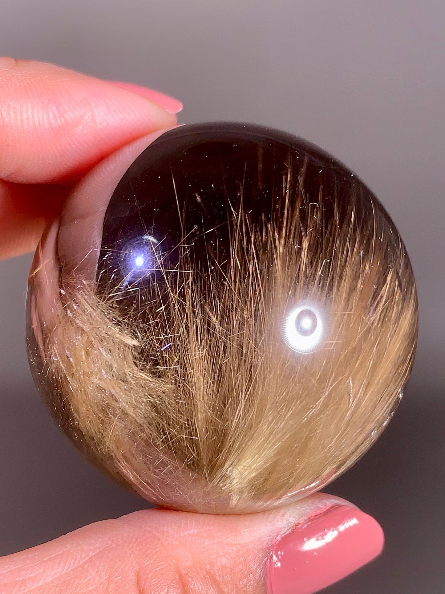 Large Collector’s Grade Gold Rutile in Smoky Quartz Sphere from Brazil