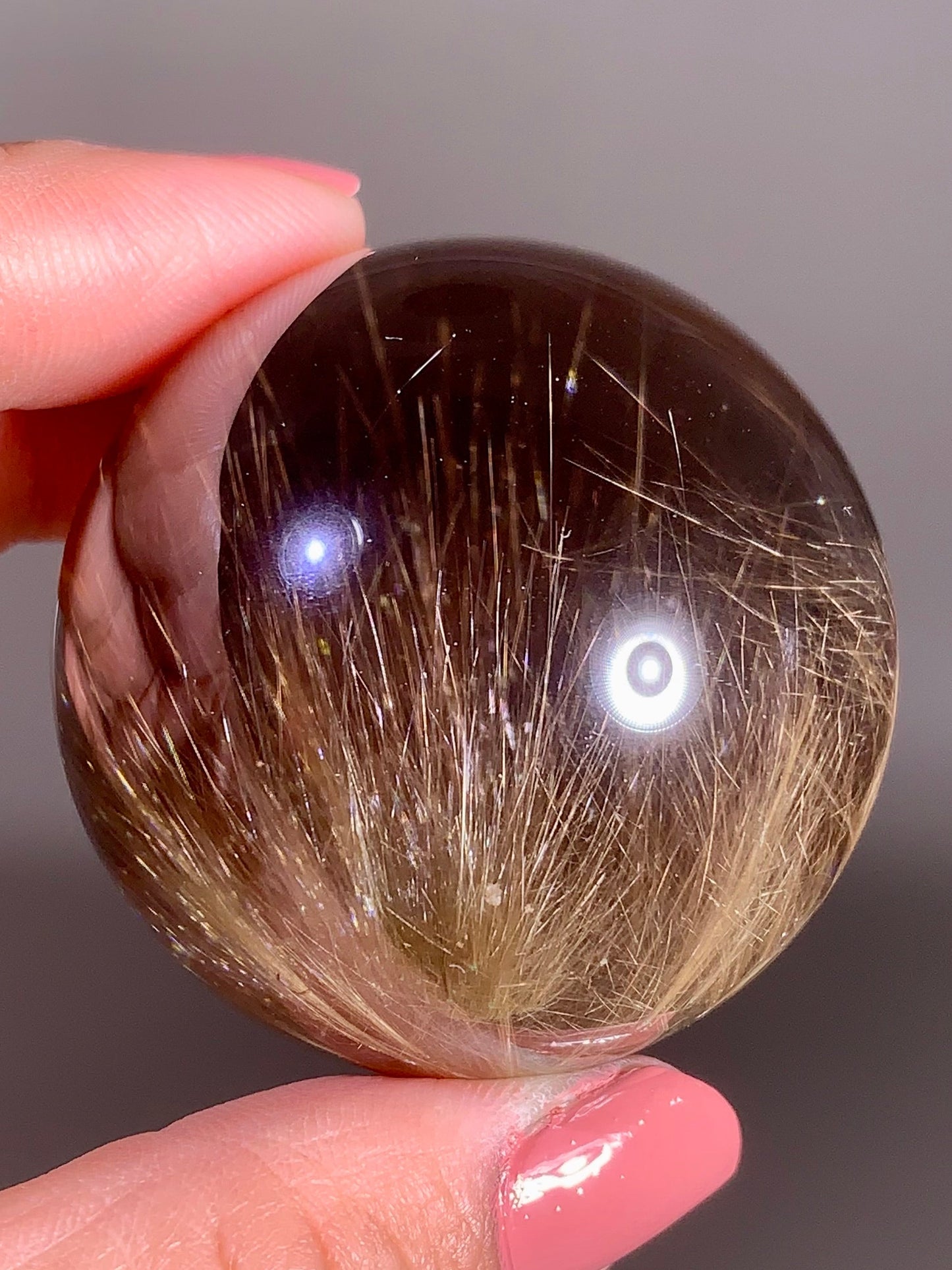 Large Collector’s Grade Gold Rutile in Smoky Quartz Sphere from Brazil