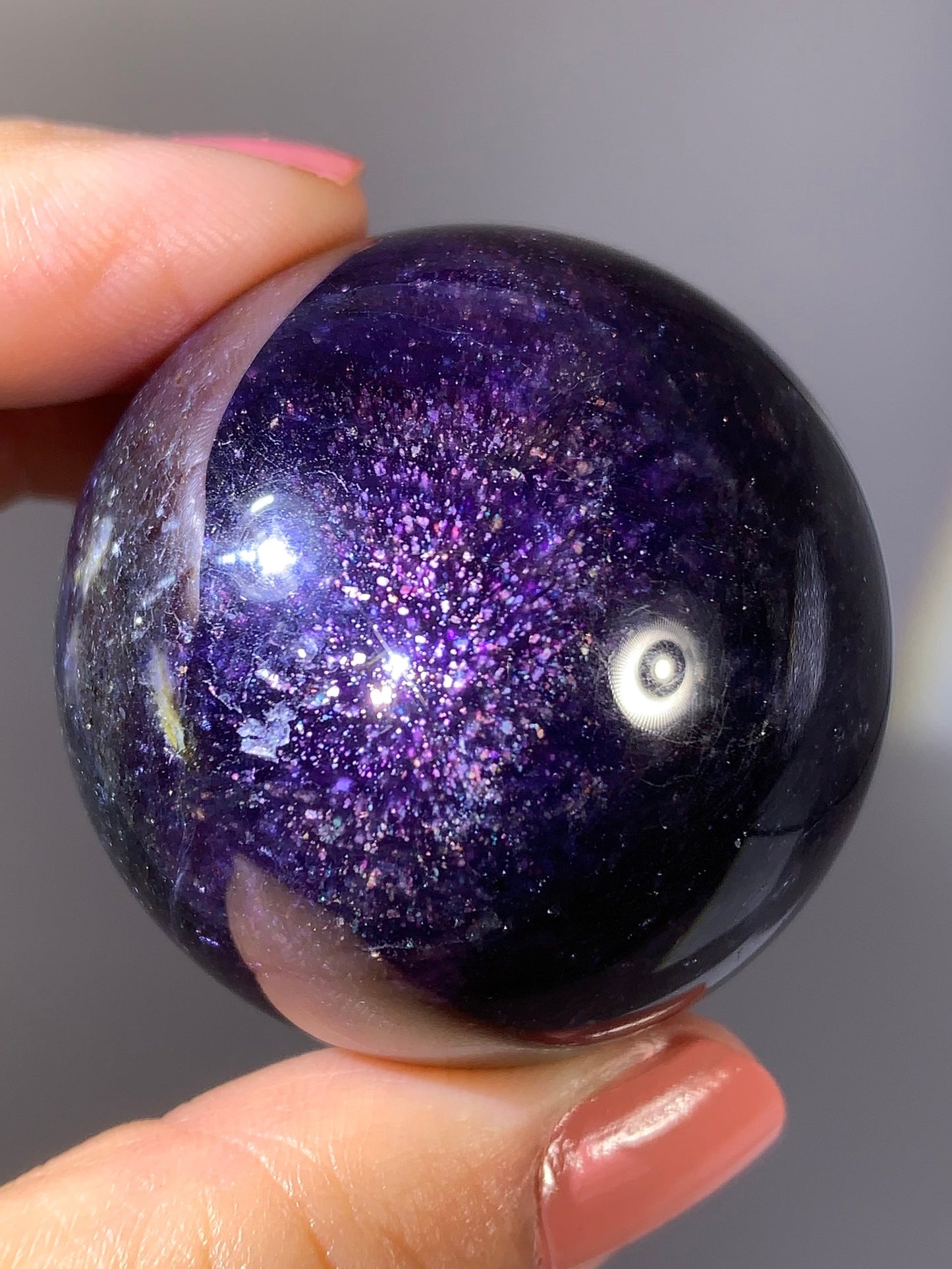 Natural High-Grade Galaxy Iolite and Sunstone Bloodshot Sphere from Tanzania