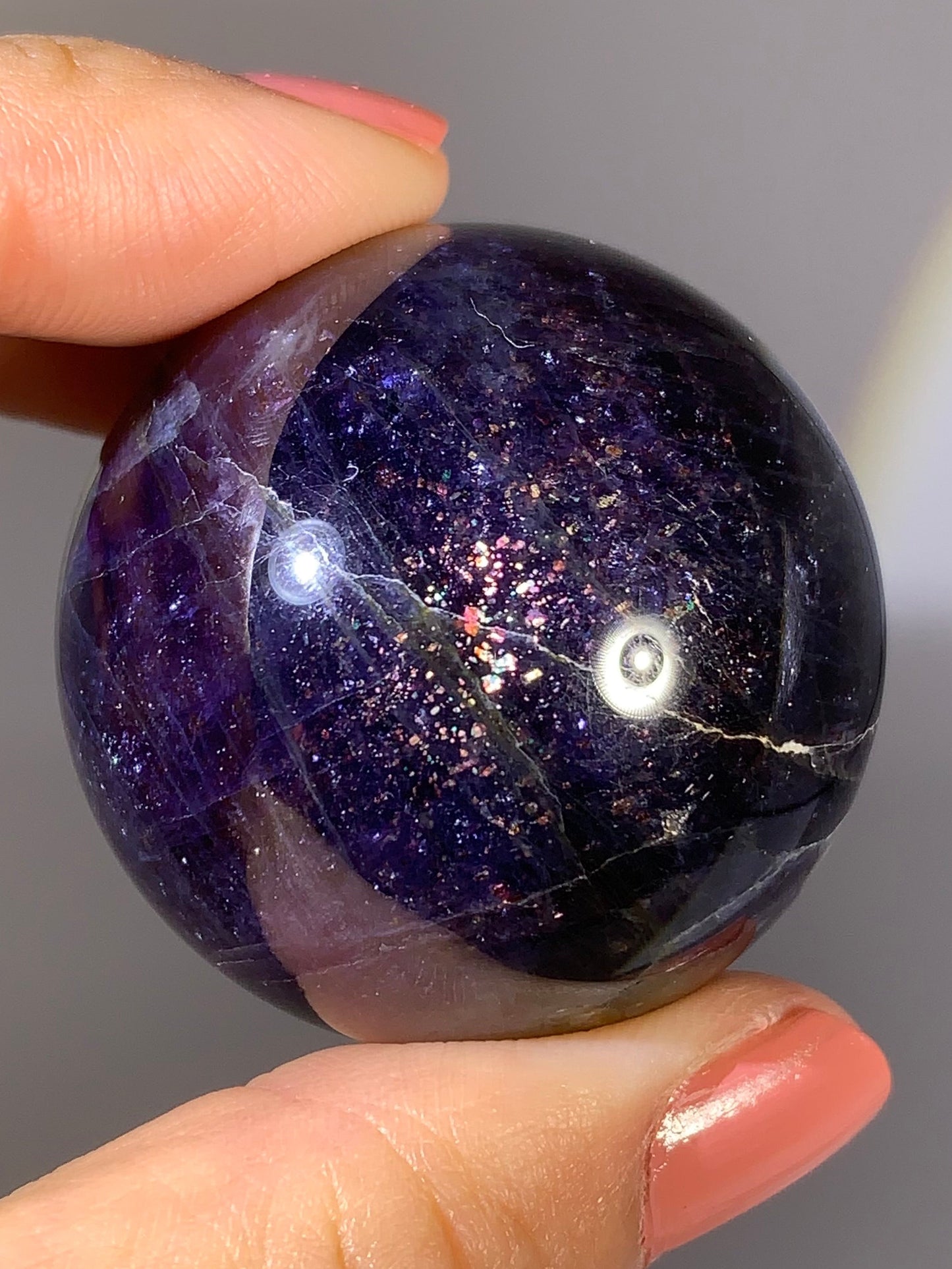 Natural High-Grade Galaxy Iolite and Sunstone Bloodshot Sphere from Tanzania