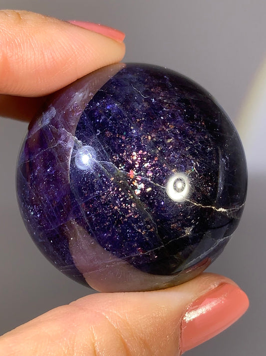 Natural High-Grade Galaxy Iolite and Sunstone Bloodshot Sphere from Tanzania