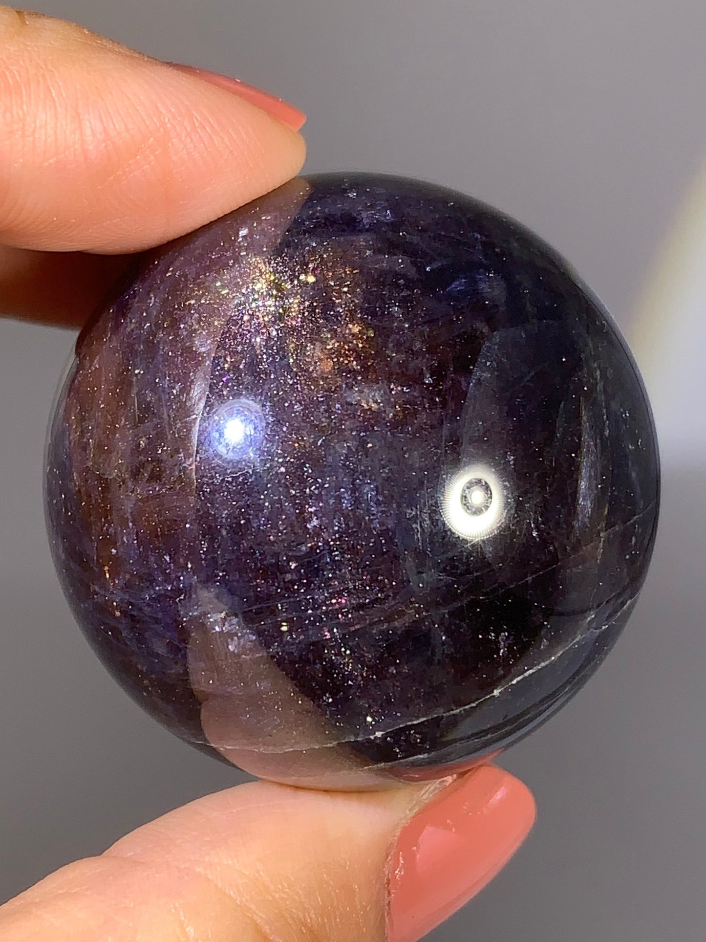 Natural High-Grade Galaxy Iolite and Sunstone Bloodshot Sphere from Tanzania