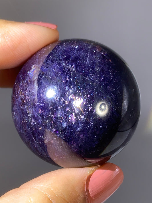 Natural High-Grade Galaxy Iolite and Sunstone Bloodshot Sphere from Tanzania