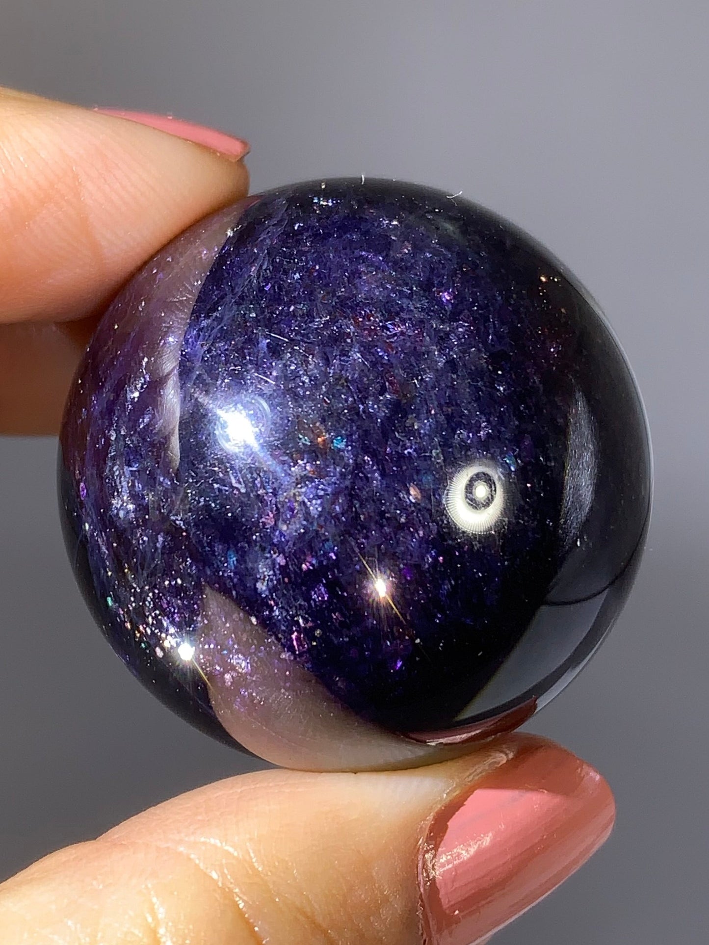 Natural High-Grade Galaxy Iolite and Sunstone Bloodshot Sphere from Tanzania