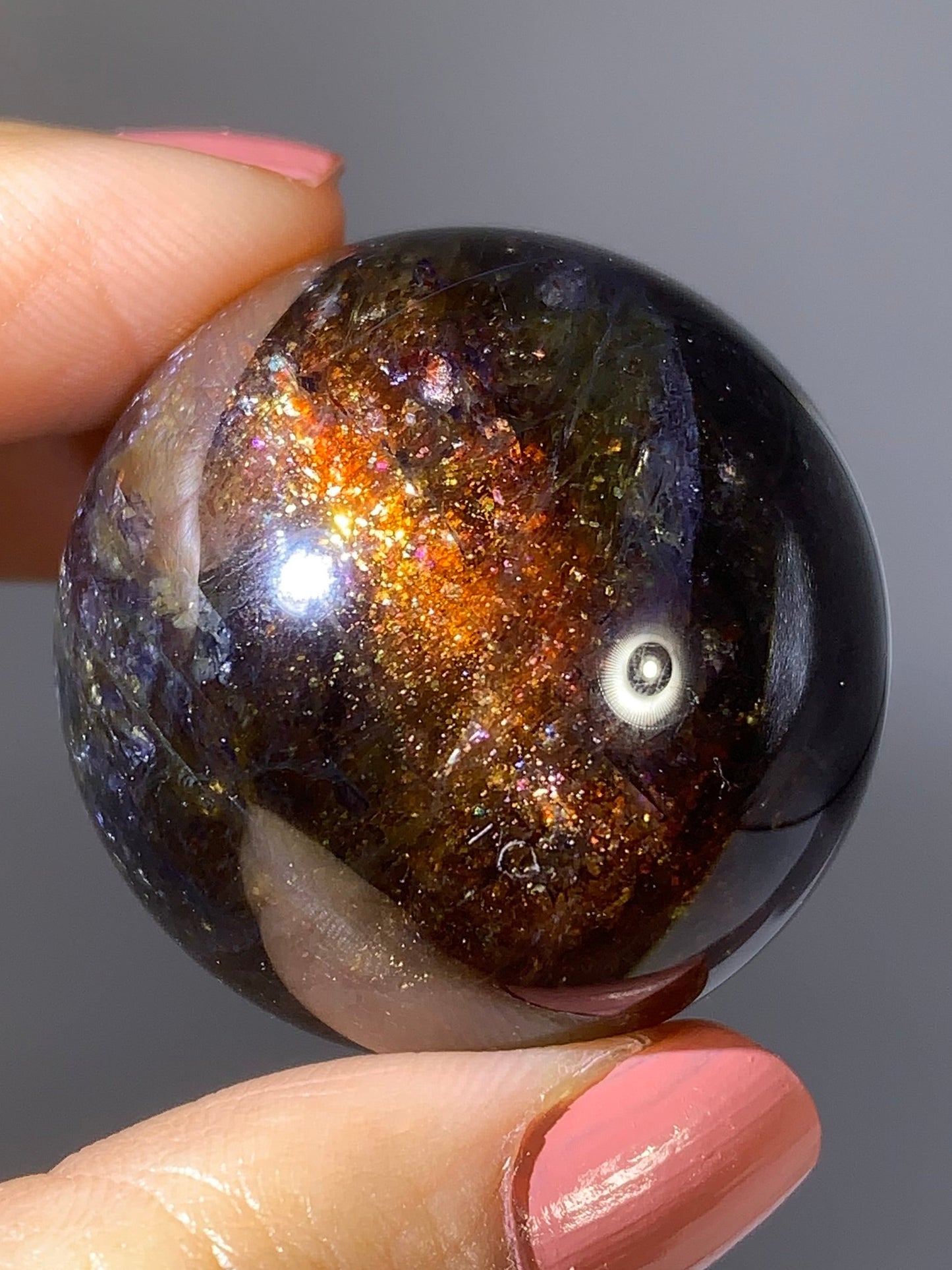 Natural High-Grade Galaxy Iolite and Sunstone Bloodshot Sphere from Tanzania