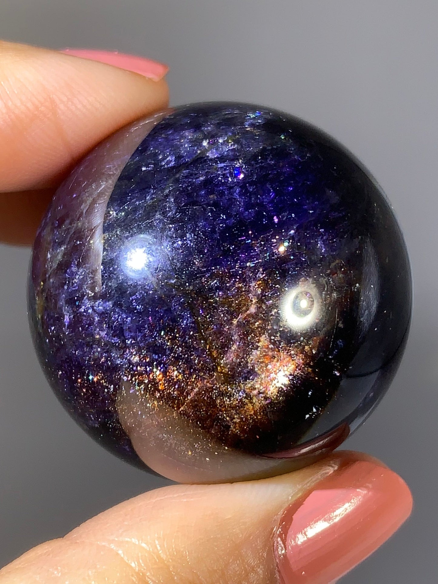 Natural High-Grade Galaxy Iolite and Sunstone Bloodshot Sphere from Tanzania