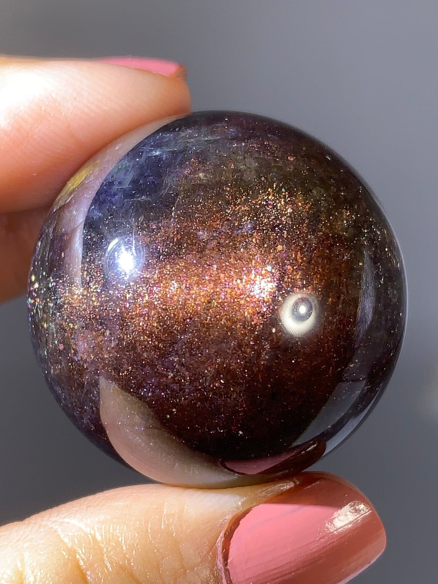 Natural High-Grade Galaxy Iolite and Sunstone Bloodshot Sphere from Tanzania