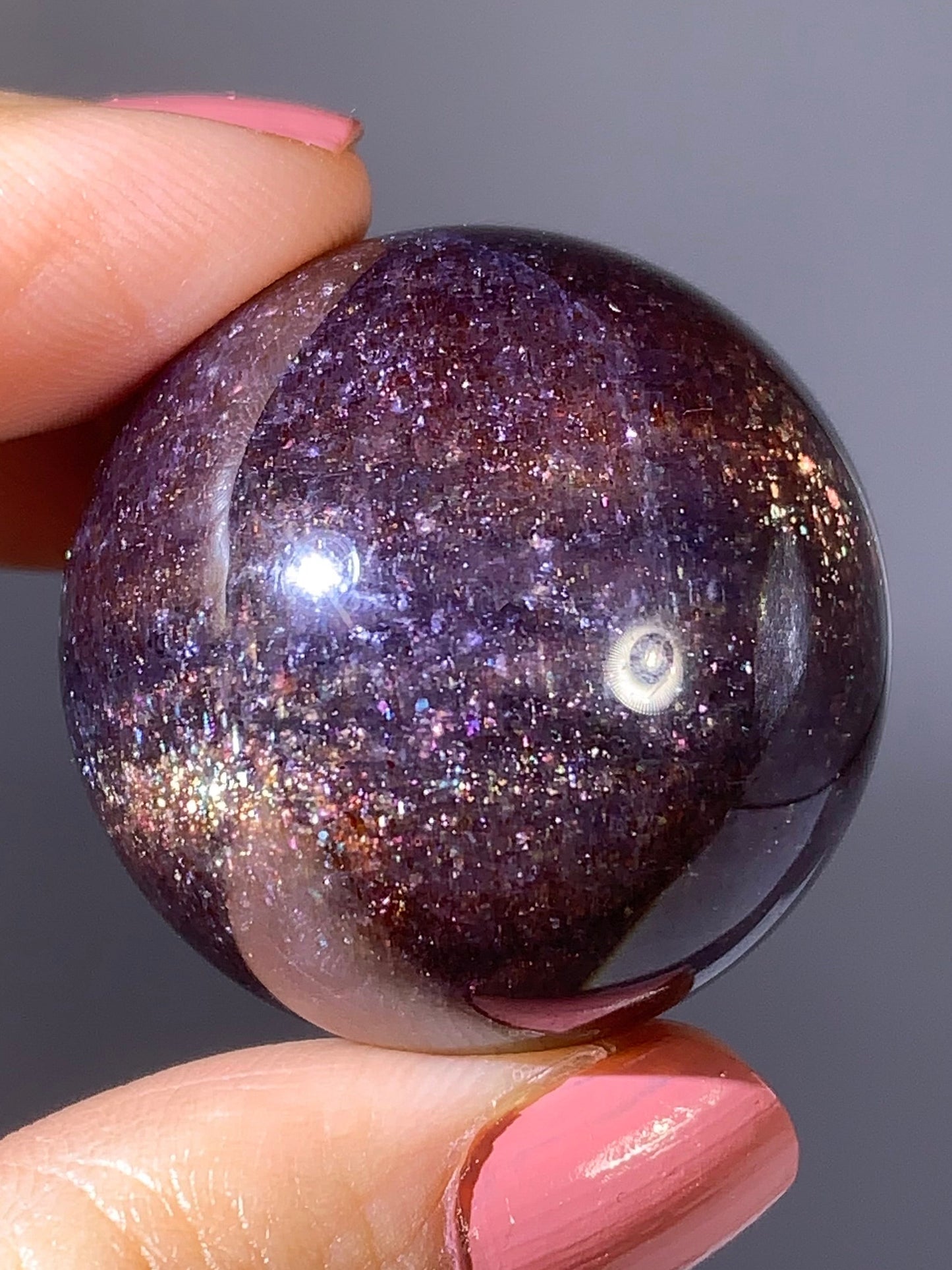 Natural High-Grade Galaxy Iolite and Sunstone Bloodshot Sphere from Tanzania