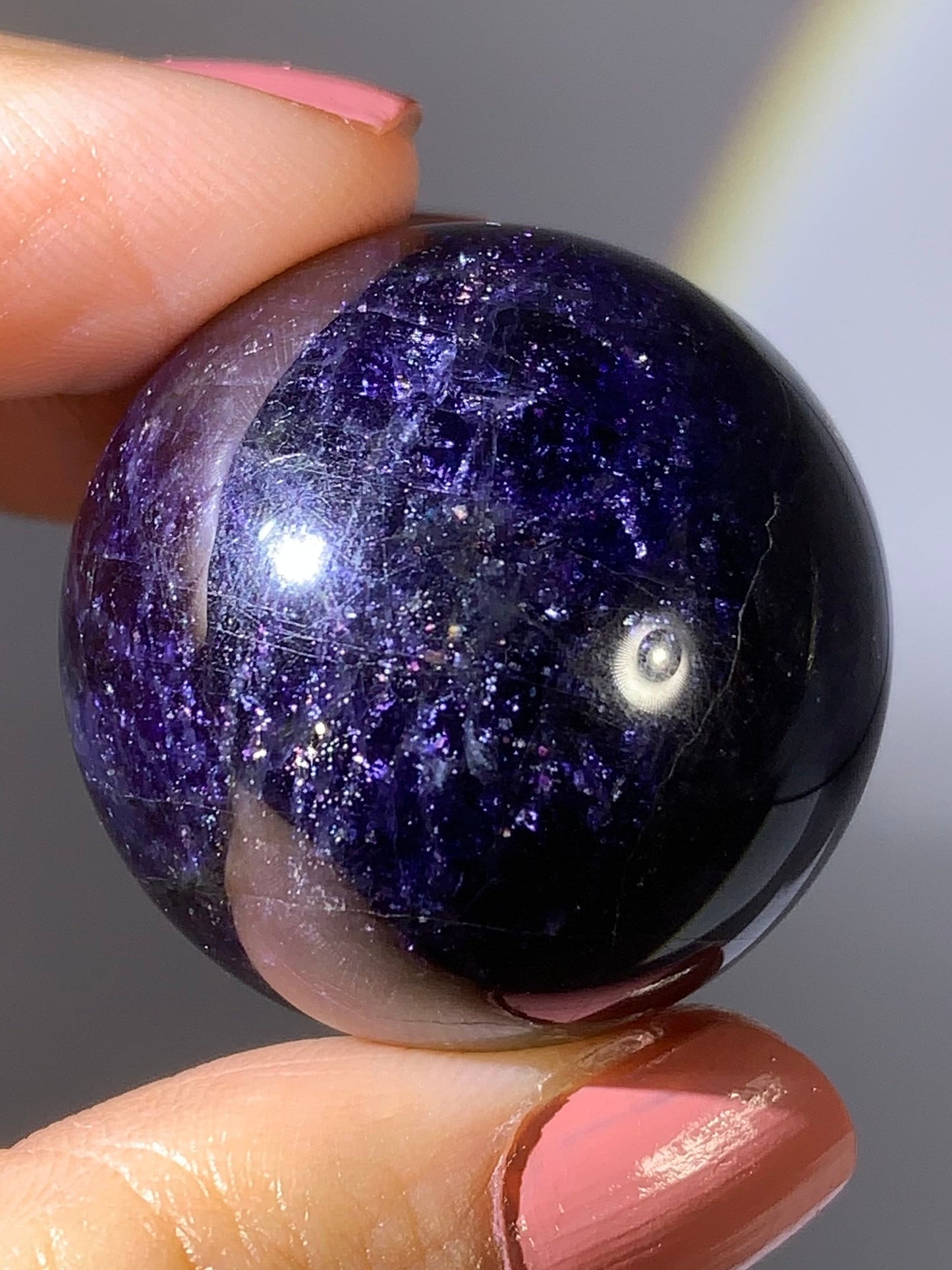 Natural High-Grade Galaxy Iolite and Sunstone Bloodshot Sphere from Tanzania