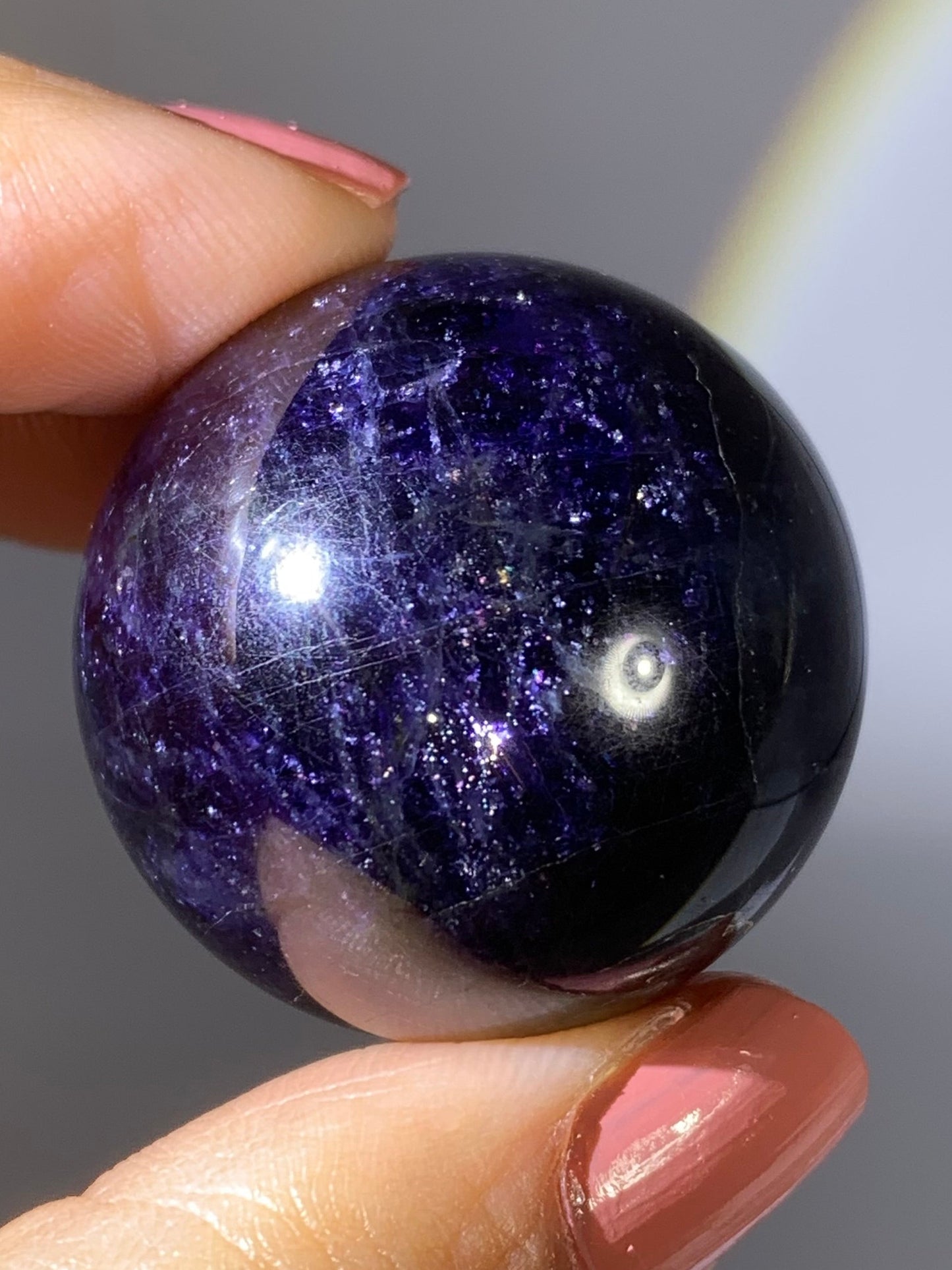 Natural High-Grade Galaxy Iolite and Sunstone Bloodshot Sphere from Tanzania