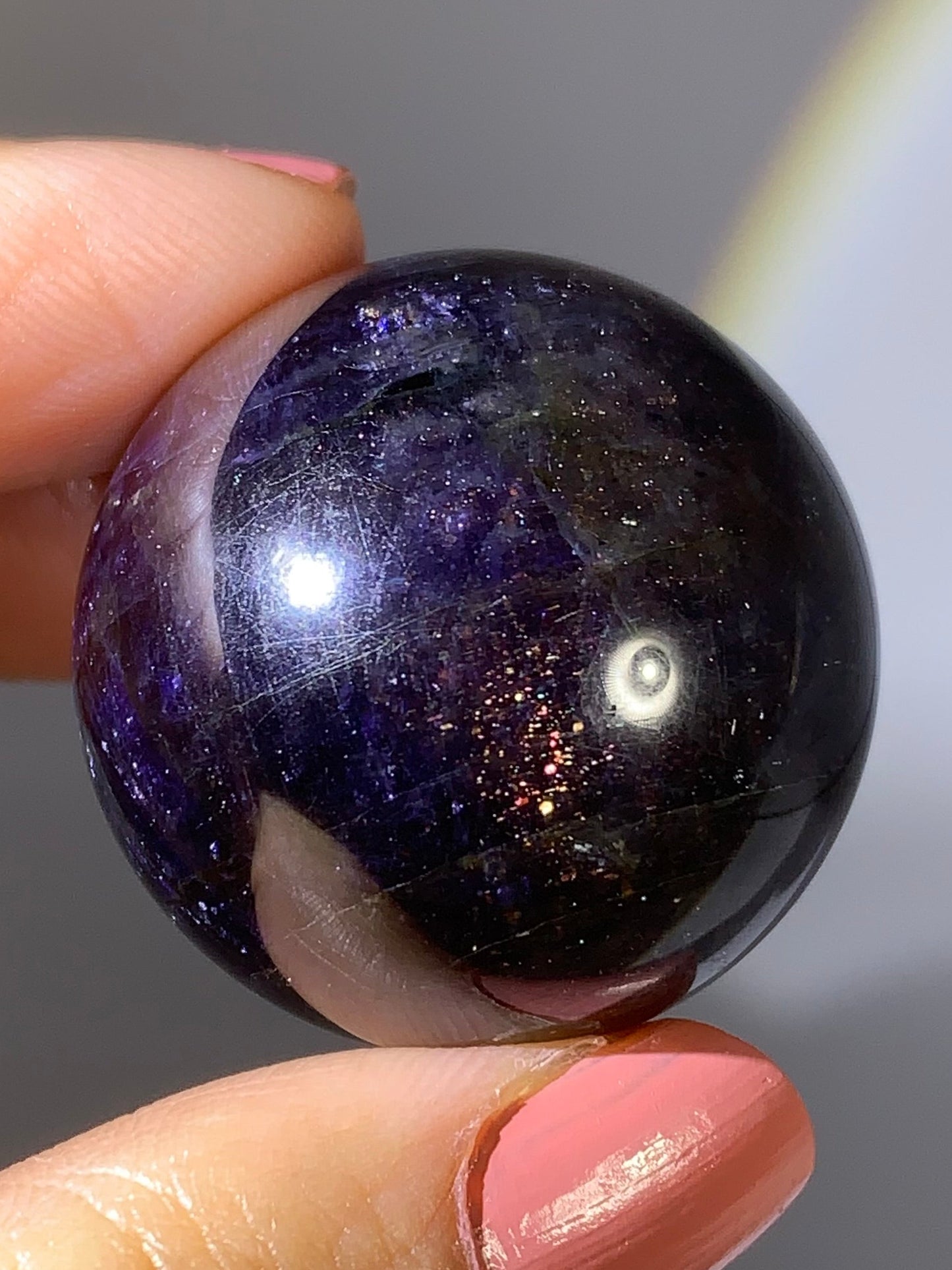 Natural High-Grade Galaxy Iolite and Sunstone Bloodshot Sphere from Tanzania