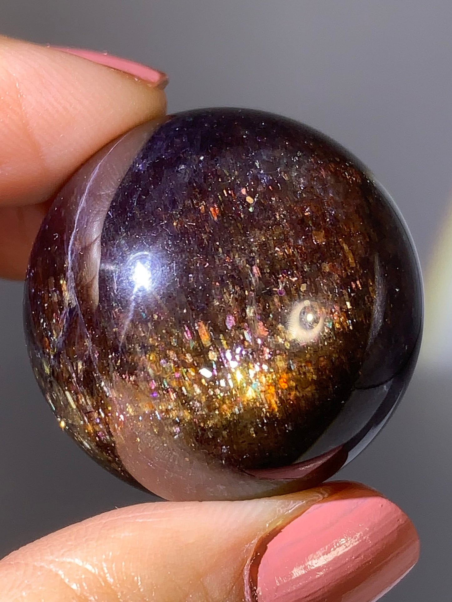 Natural High-Grade Galaxy Iolite and Sunstone Bloodshot Sphere from Tanzania
