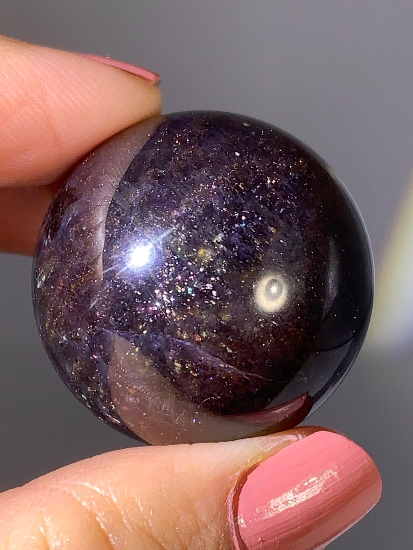 Natural High-Grade Galaxy Iolite and Sunstone Bloodshot Sphere from Tanzania