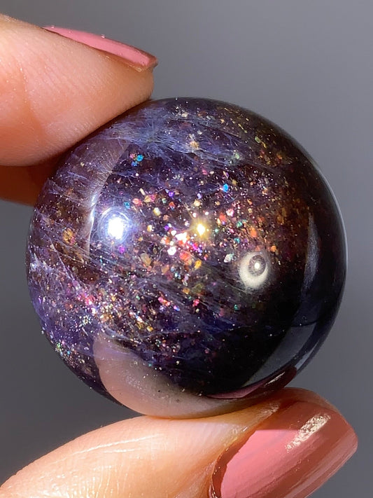 Natural High-Grade Galaxy Iolite and Sunstone Bloodshot Sphere from Tanzania