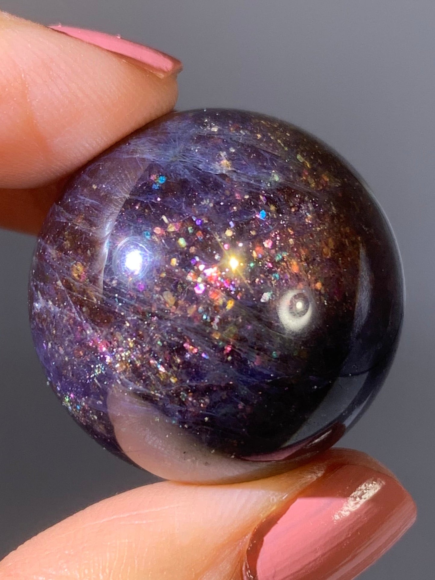 Natural High-Grade Galaxy Iolite and Sunstone Bloodshot Sphere from Tanzania