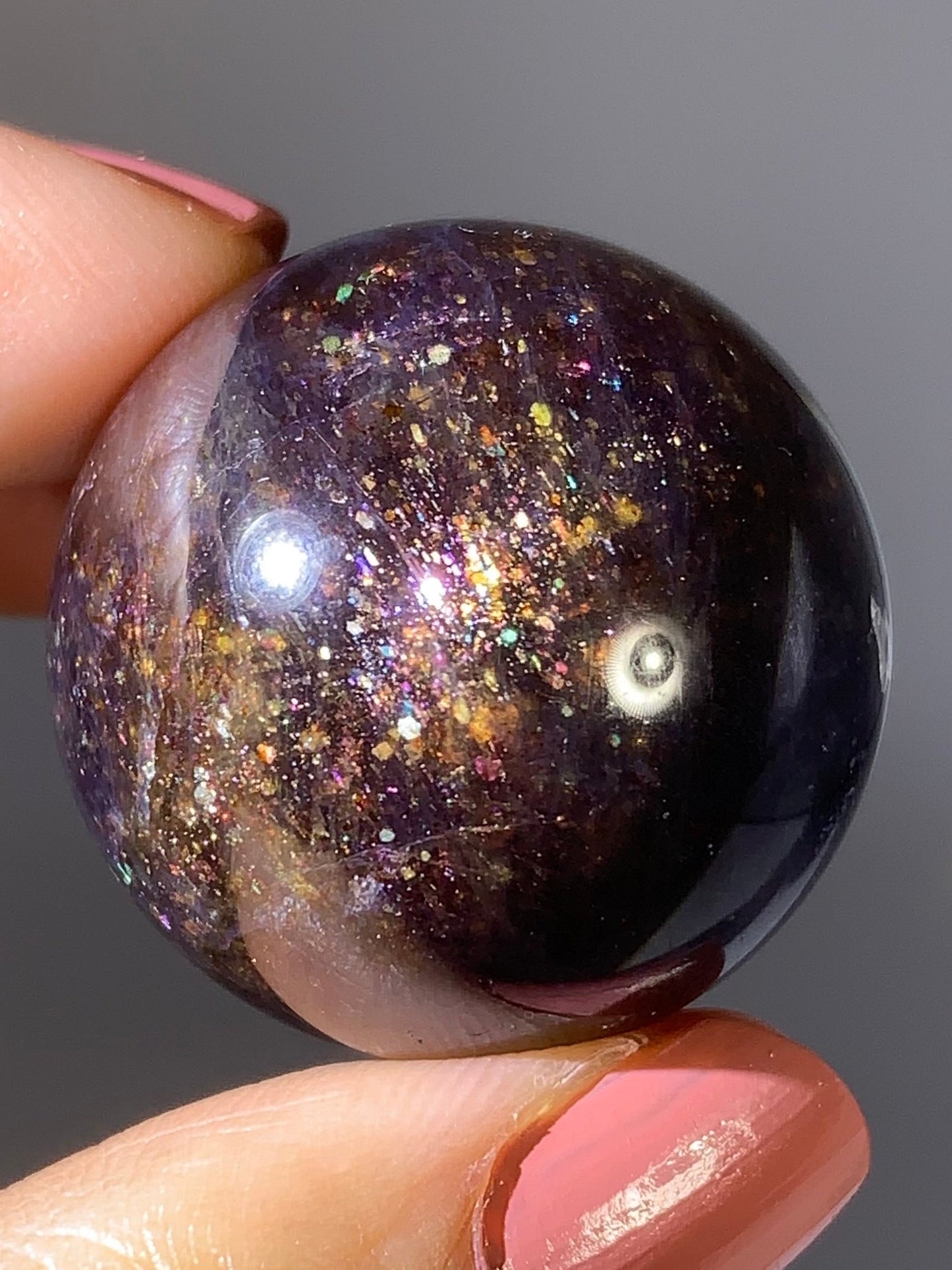 Natural High-Grade Galaxy Iolite and Sunstone Bloodshot Sphere from Tanzania