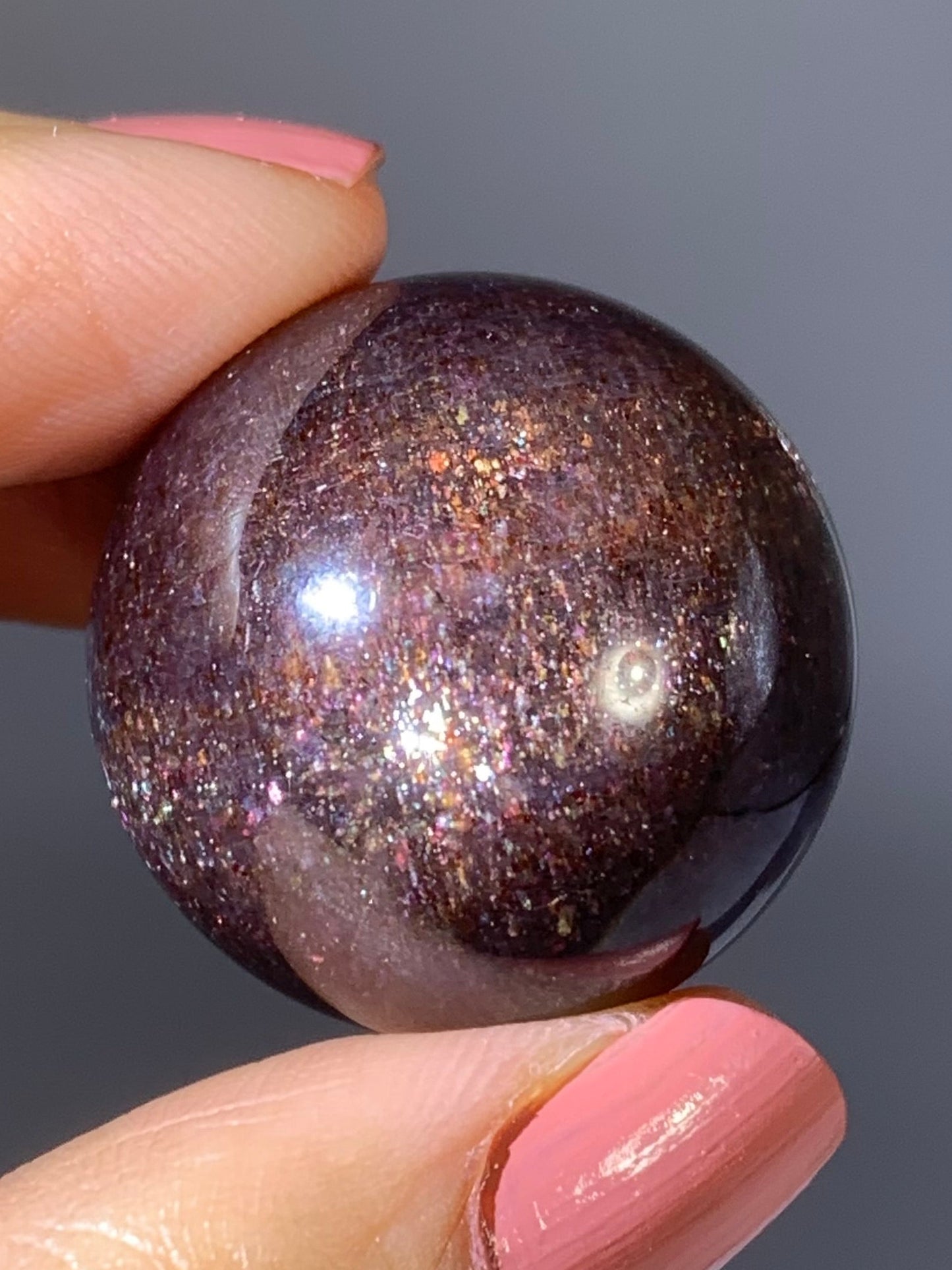 Natural High-Grade Galaxy Iolite and Sunstone Bloodshot Sphere from Tanzania