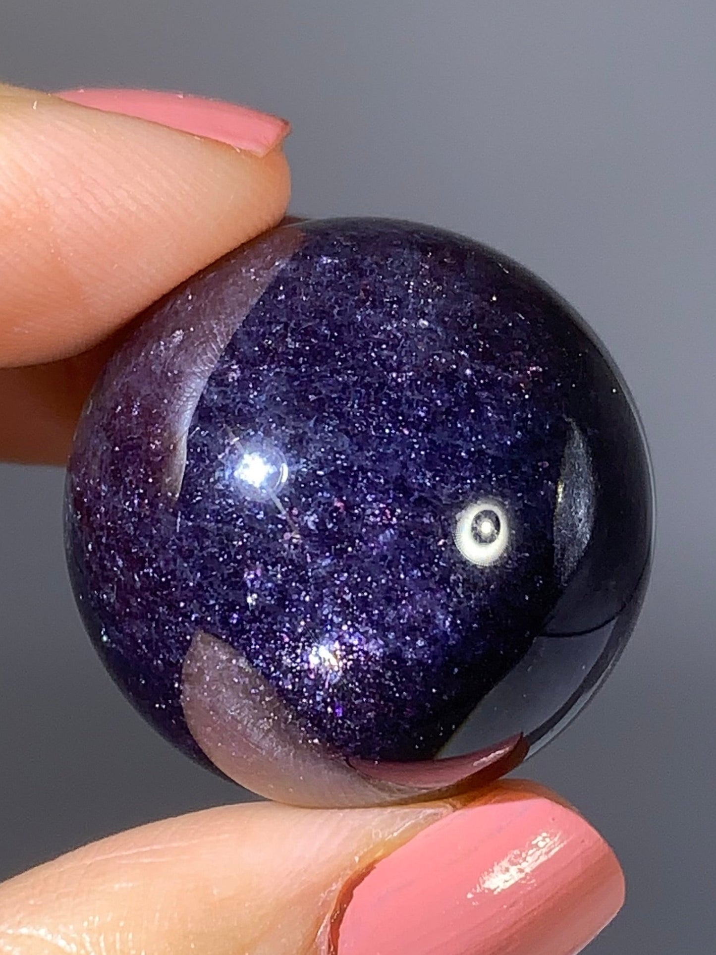 Natural High-Grade Galaxy Iolite and Sunstone Bloodshot Sphere from Tanzania
