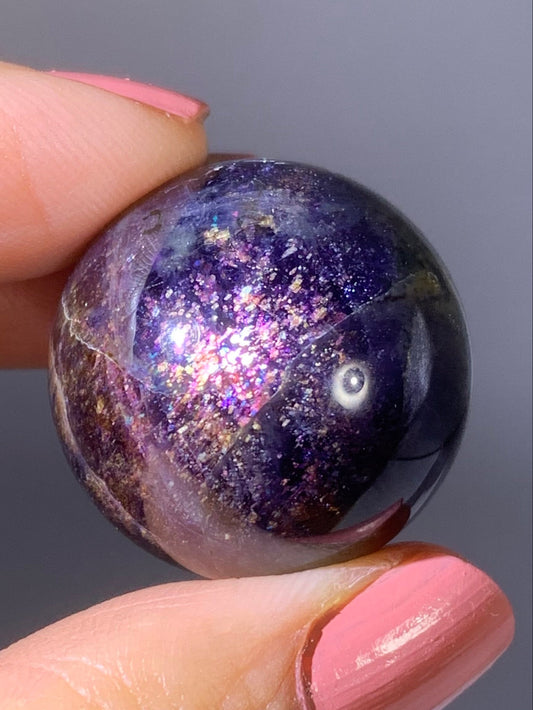 Natural High-Grade Galaxy Iolite and Sunstone Bloodshot Sphere from Tanzania