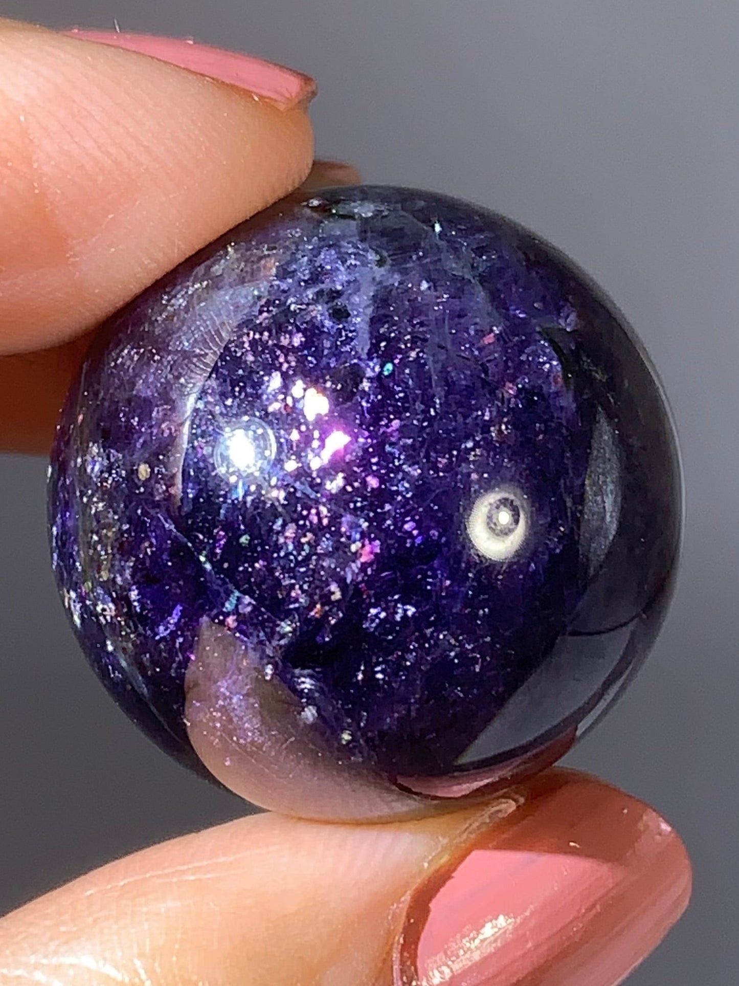 Natural High-Grade Galaxy Iolite and Sunstone Bloodshot Sphere from Tanzania
