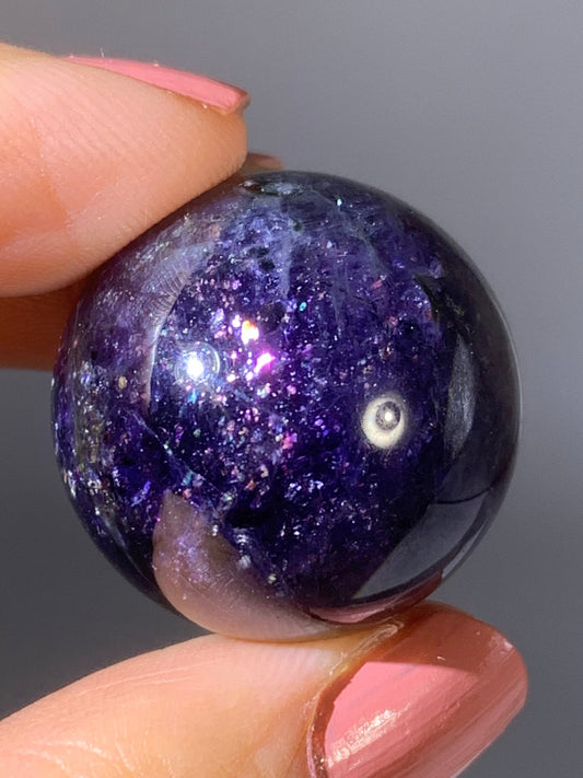 Natural High-Grade Galaxy Iolite and Sunstone Bloodshot Sphere from Tanzania