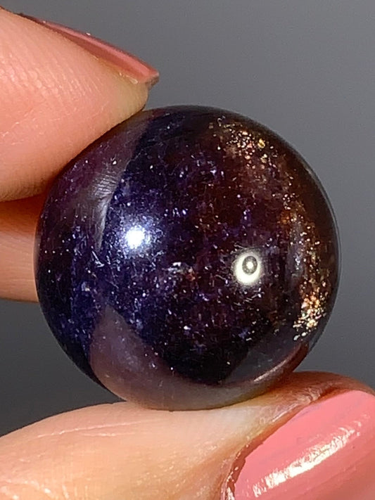 Natural High-Grade Galaxy Iolite and Sunstone Bloodshot Sphere from Tanzania