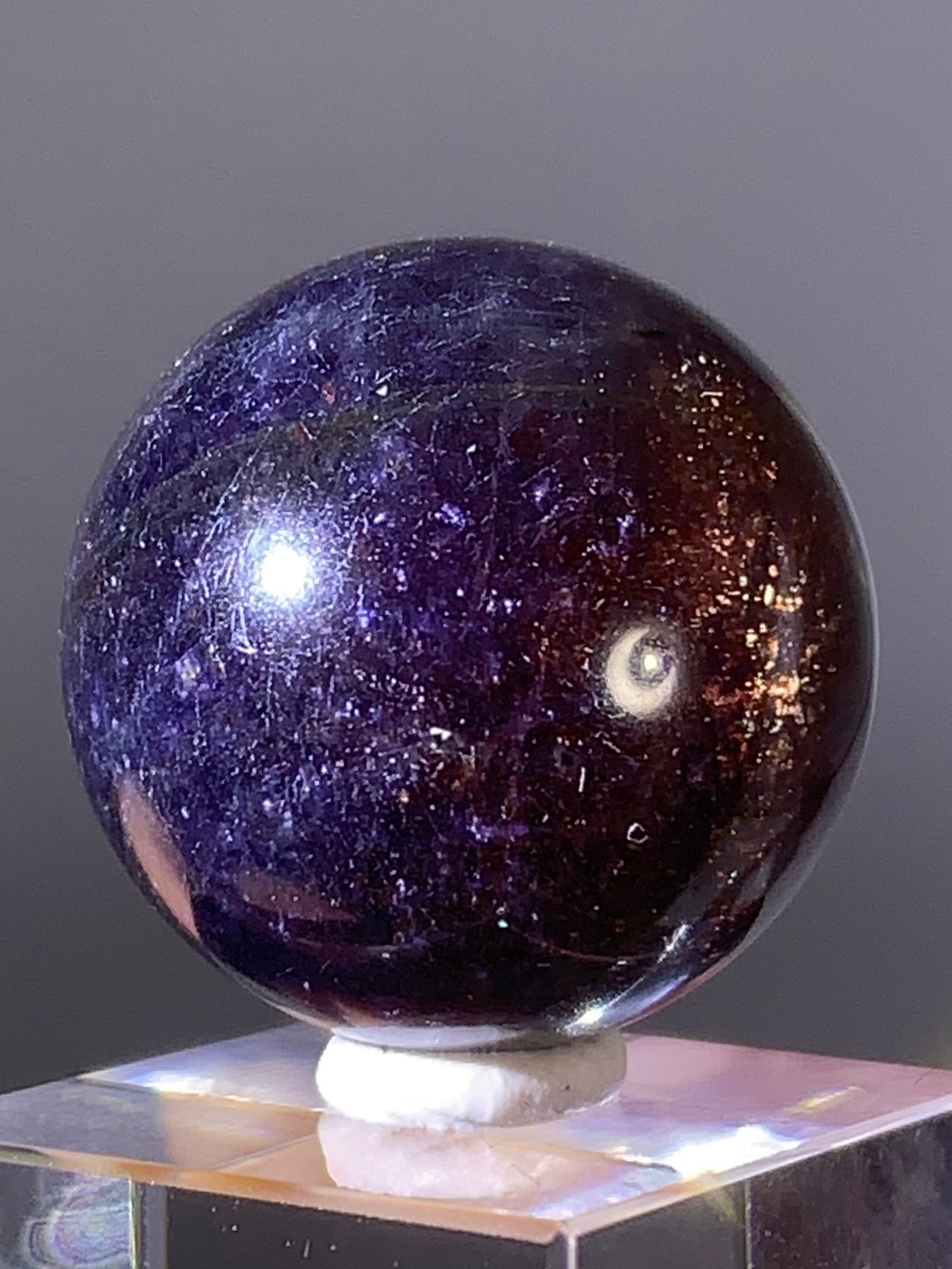Natural High-Grade Galaxy Iolite and Sunstone Bloodshot Sphere from Tanzania
