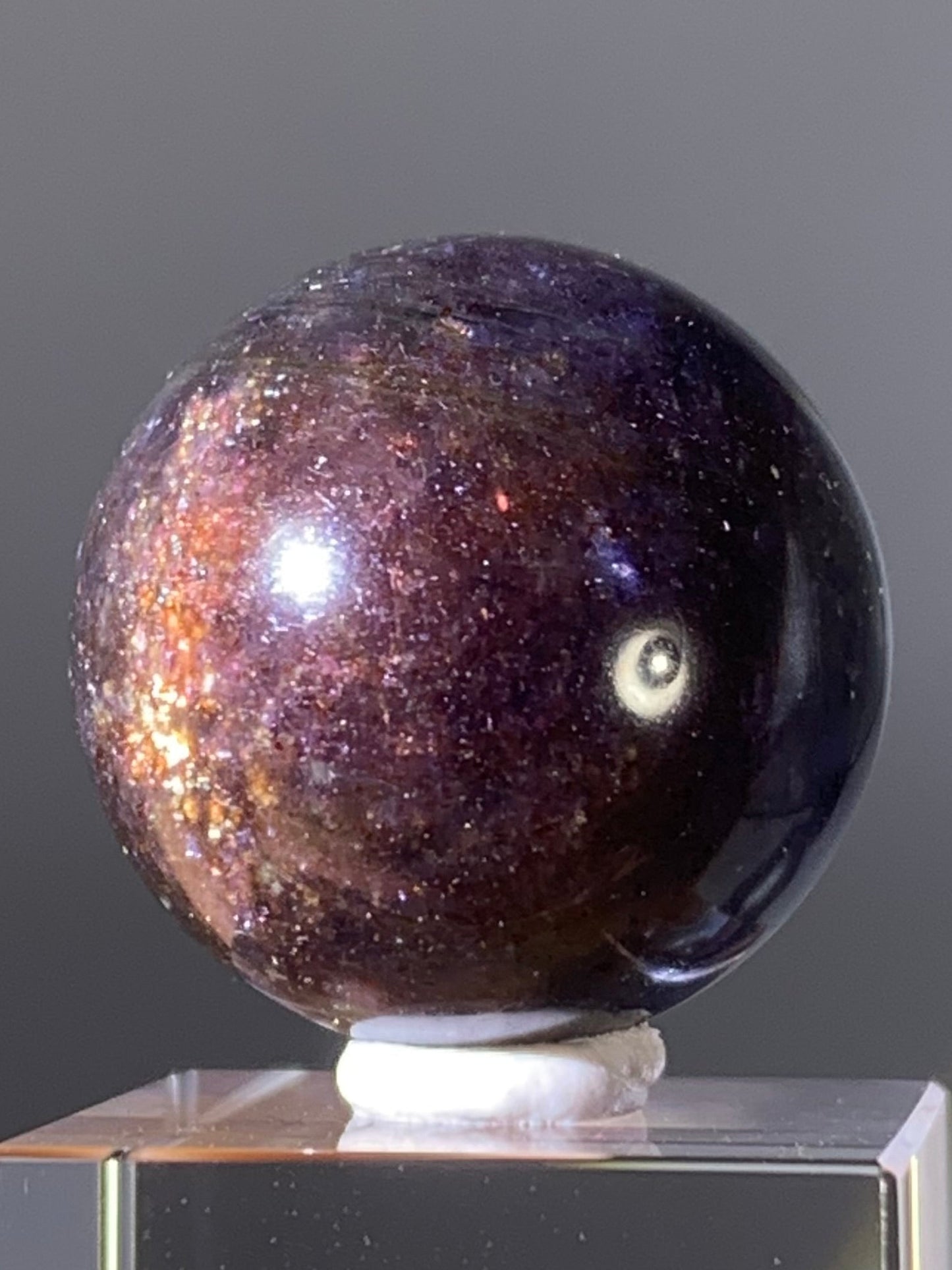 Natural High-Grade Galaxy Iolite and Sunstone Bloodshot Sphere from Tanzania