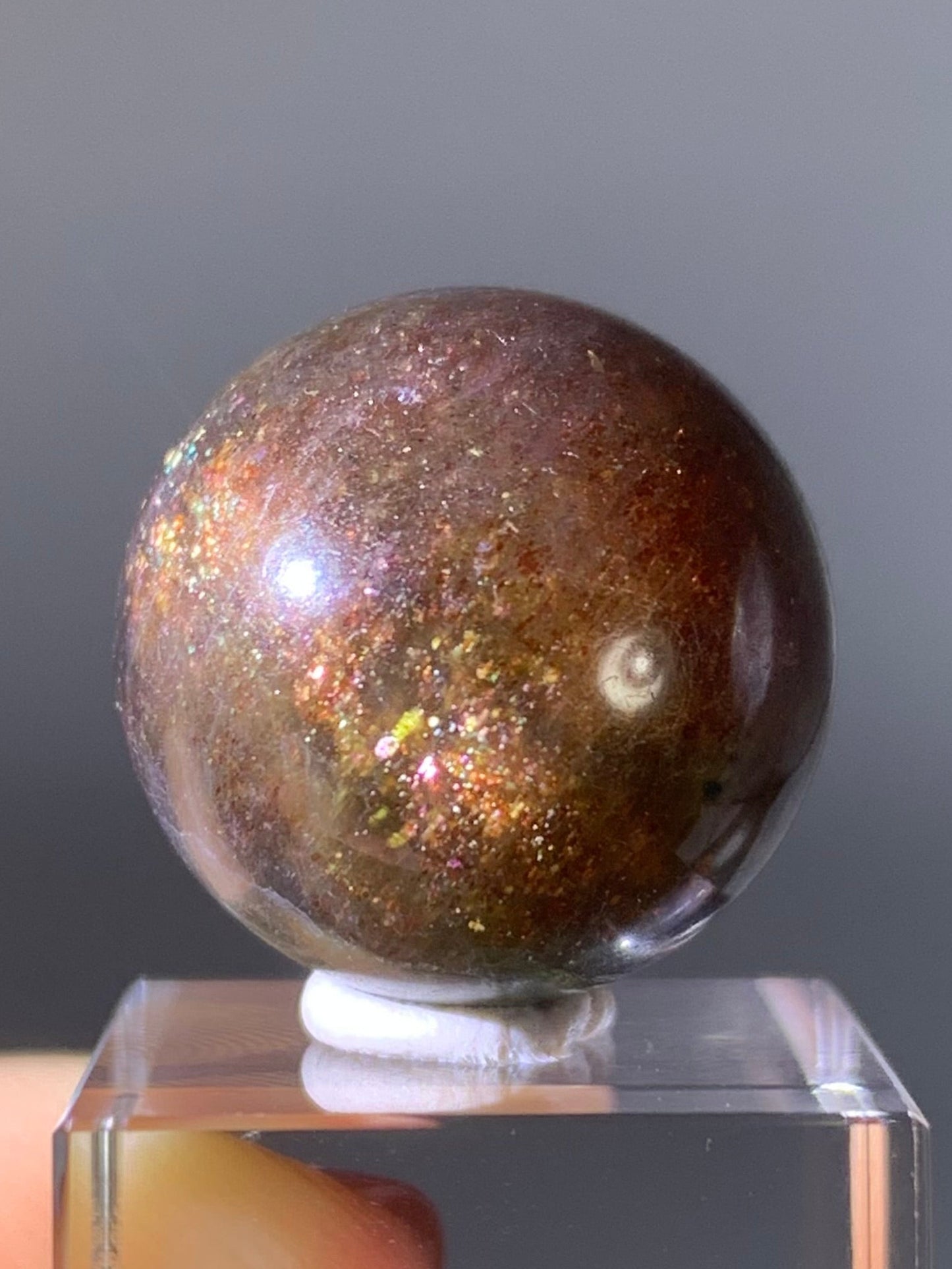 Natural High-Grade Galaxy Iolite and Sunstone Bloodshot Sphere from Tanzania